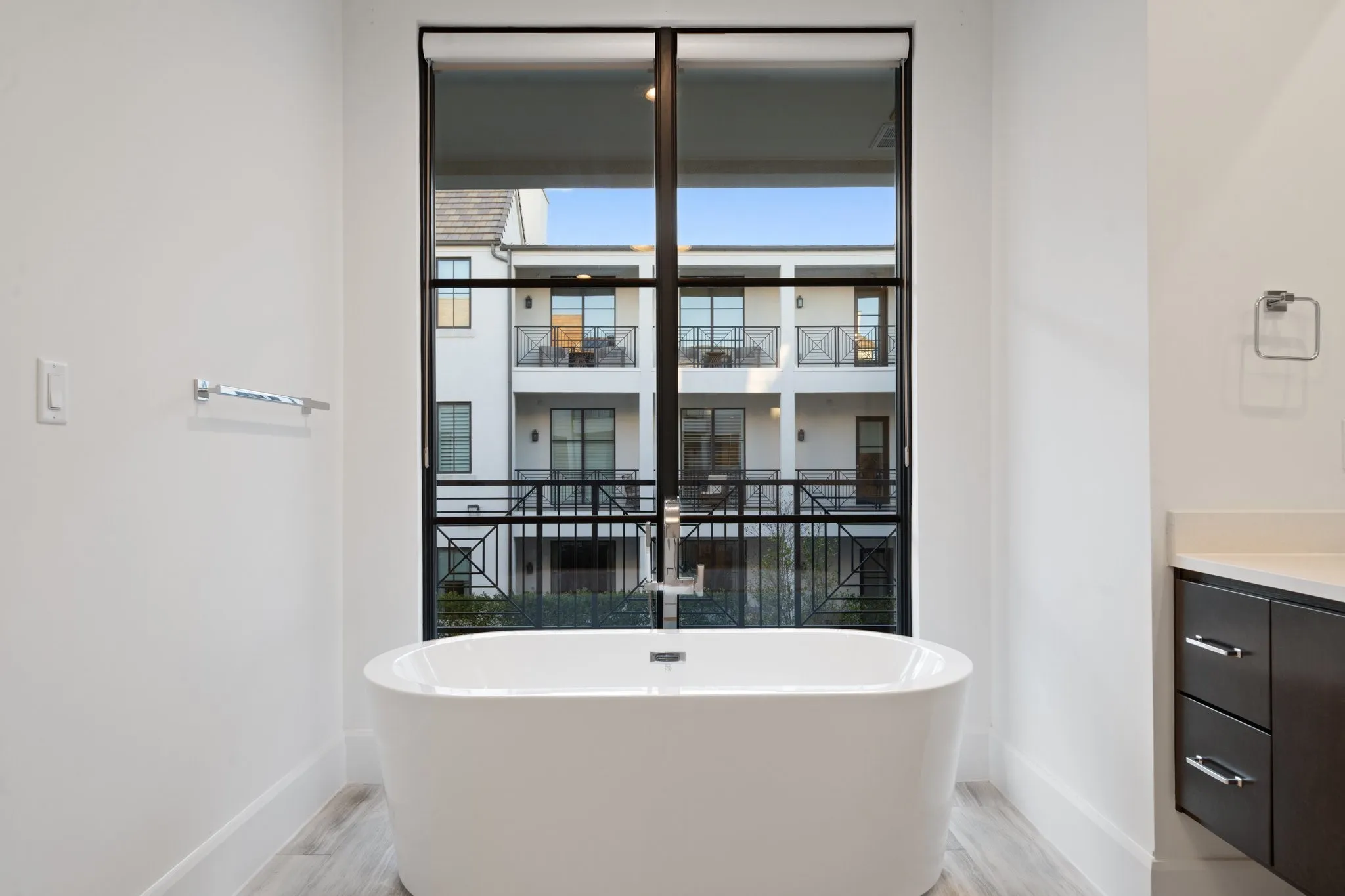 A freestanding soaking tub creates the perfect place to relax and recharge.