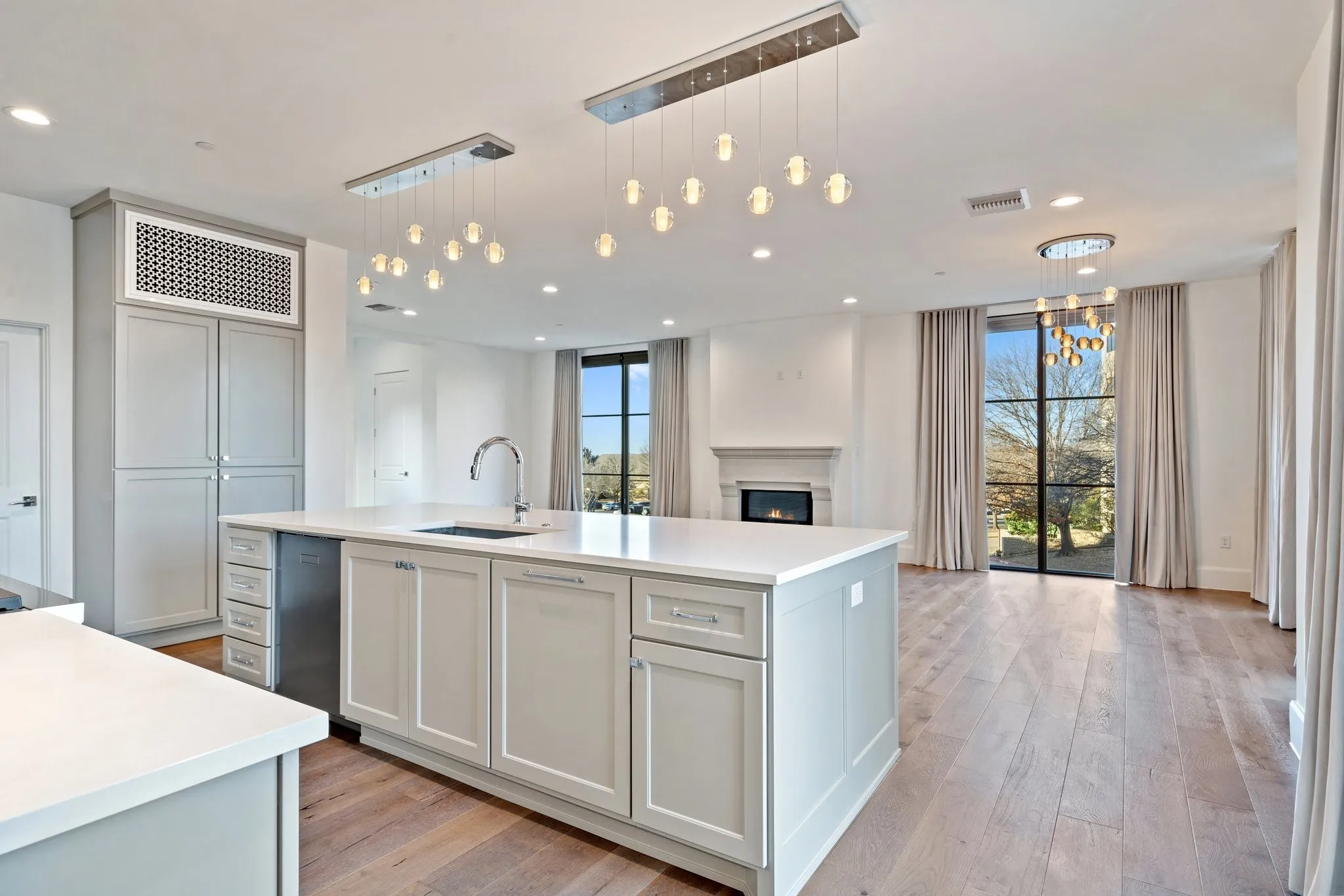 Designed for connection, the gourmet kitchen flows seamlessly into the main living area.