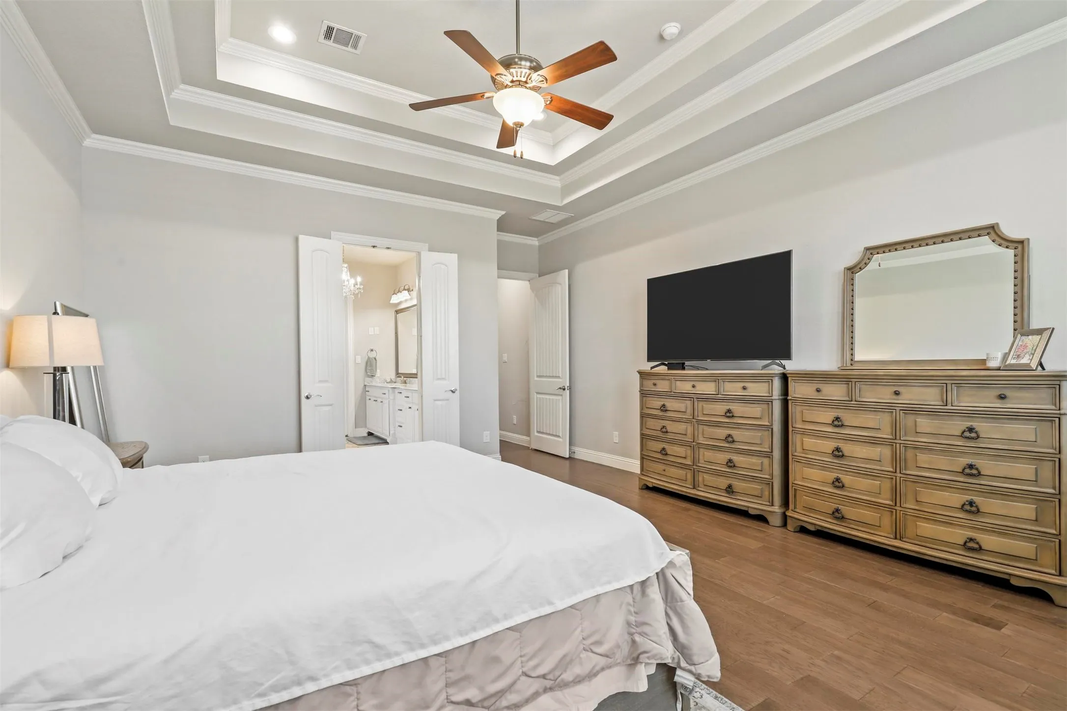 Wood-finish flooring with a multi-layered tray ceiling