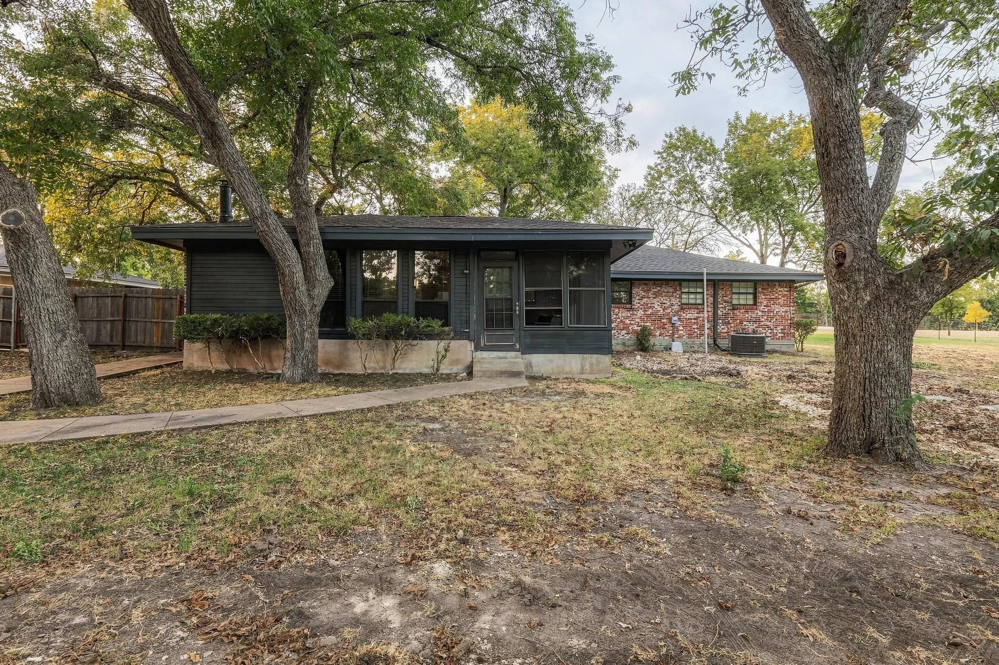 Rear view of larger home.