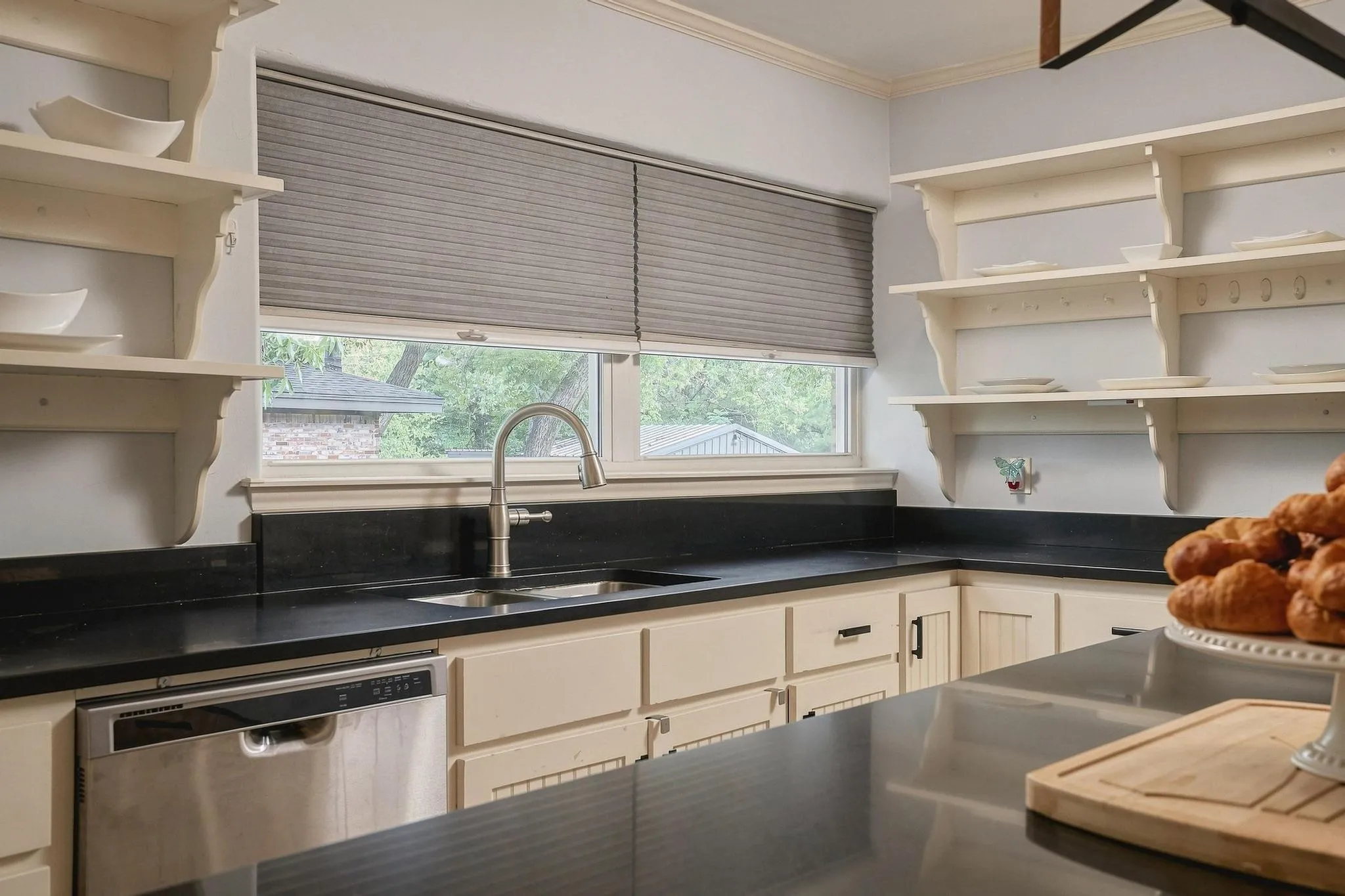 Lots of prep space and open shelves.