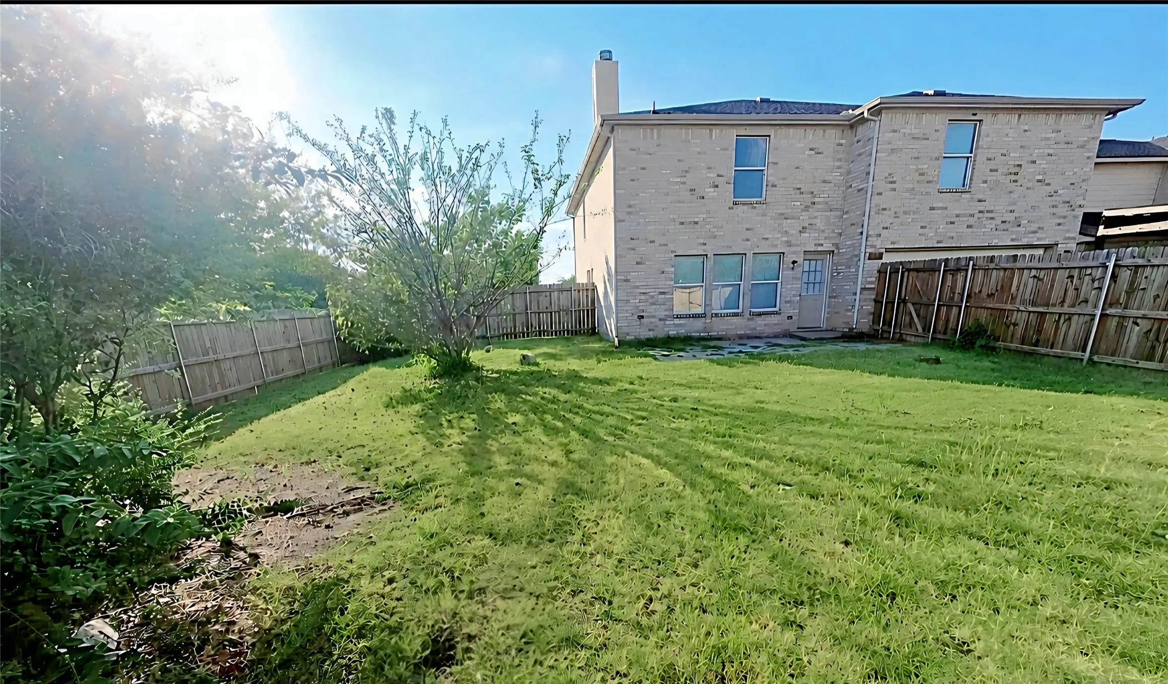 Fenced backyard, lots of privacy space for relaxing and entertaining.