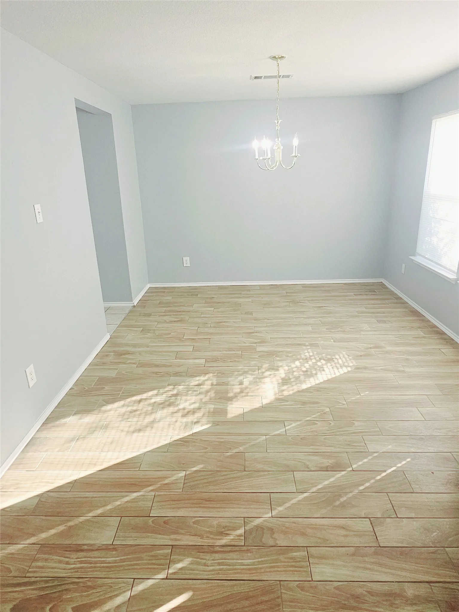 Tile flooring, bright lighting.