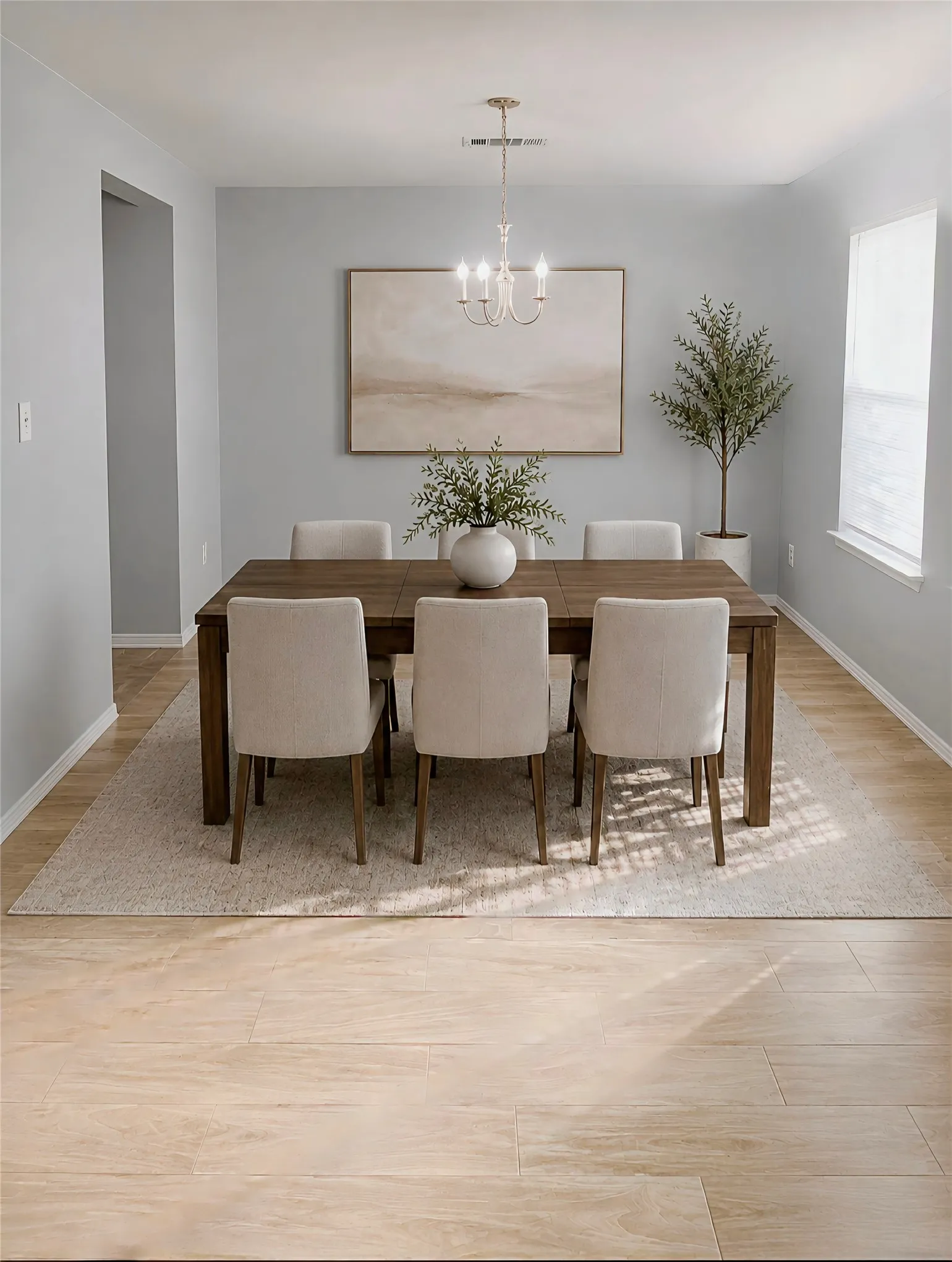 Wood-like tile flooring, light gray wall color, and a window with blinds