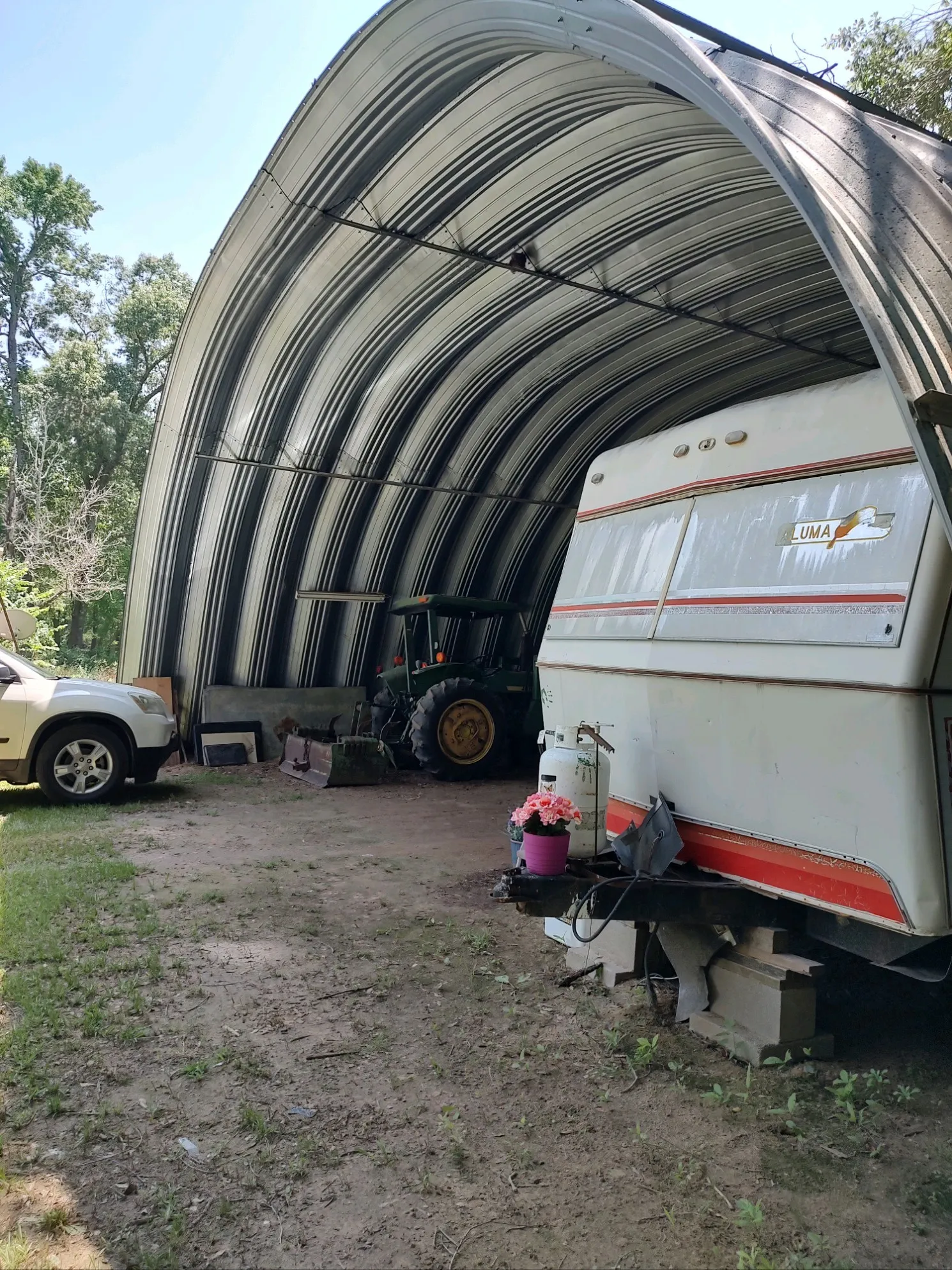 Quonset hay barn.