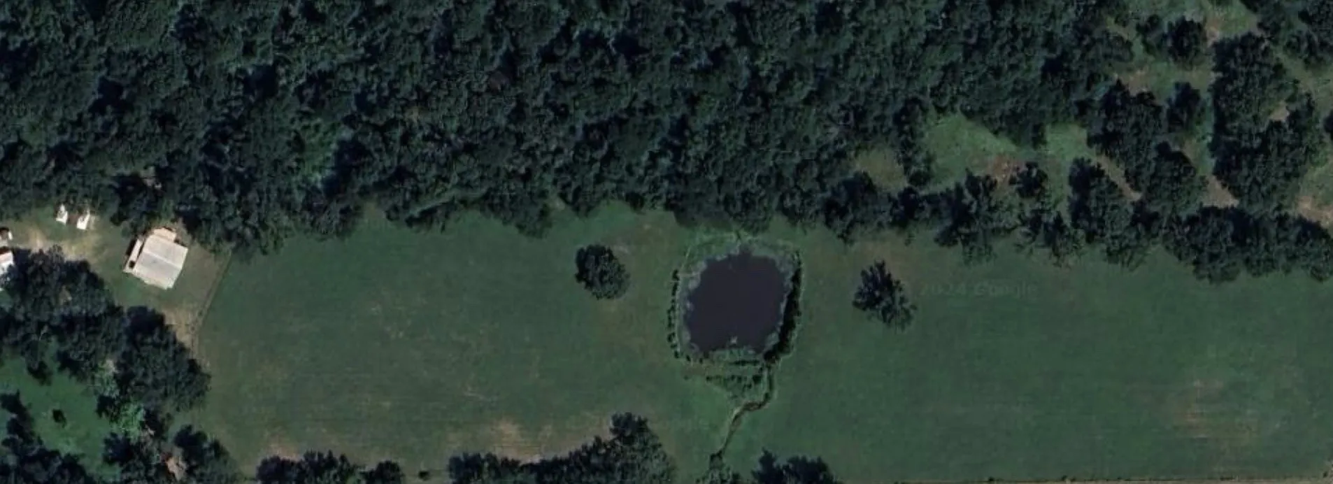 Sat view of house and main pond.