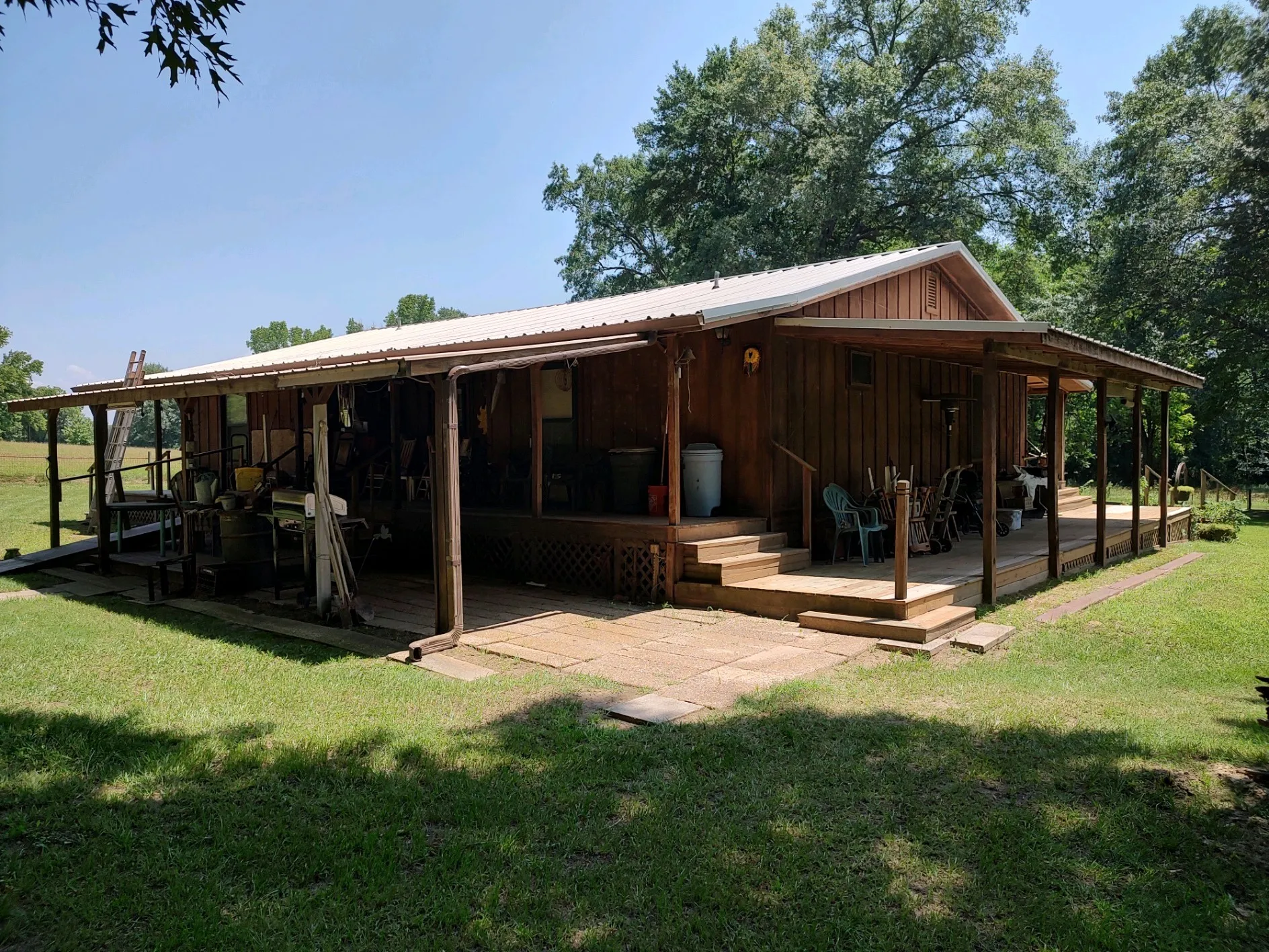 Back and side views, 3-sided covered porches.