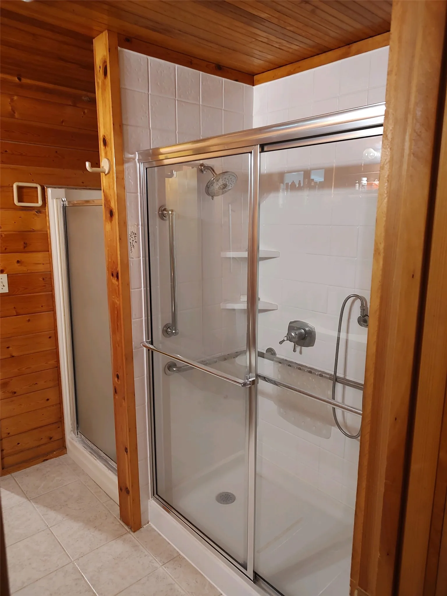 Primary bathroom with 2 showers.