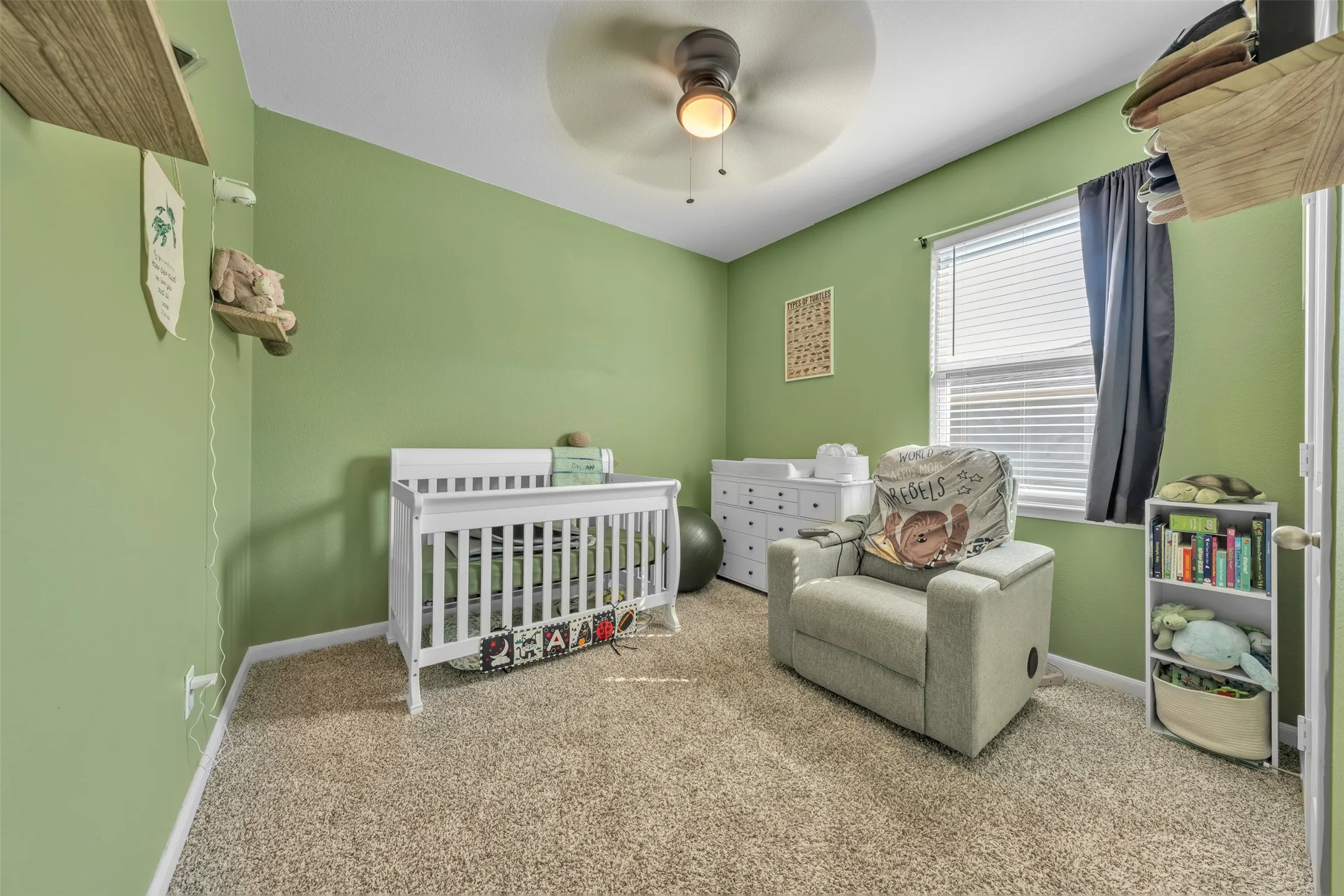 Neutral wall color with a ceiling fan