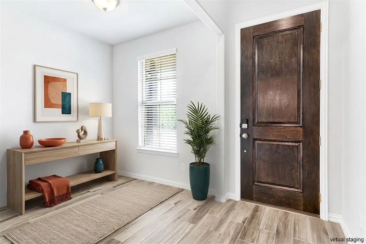 Extra room off the entry way is perfect for a home office or extra sitting area