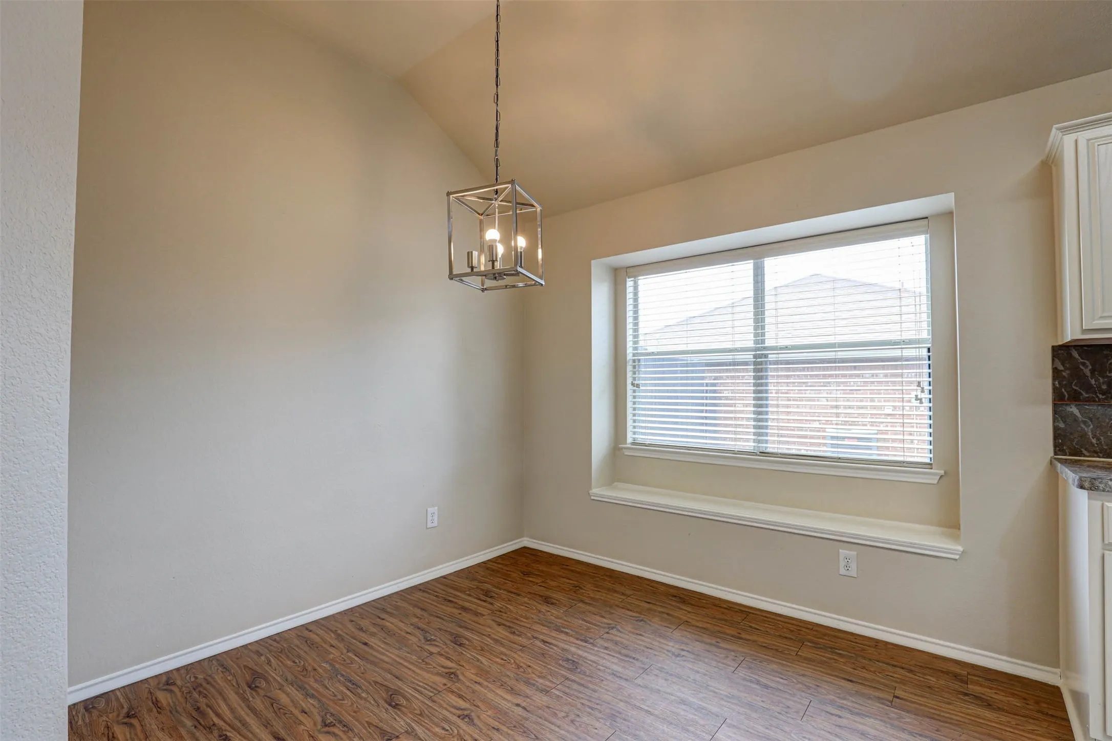 Spacious breakfast area includes a window seat