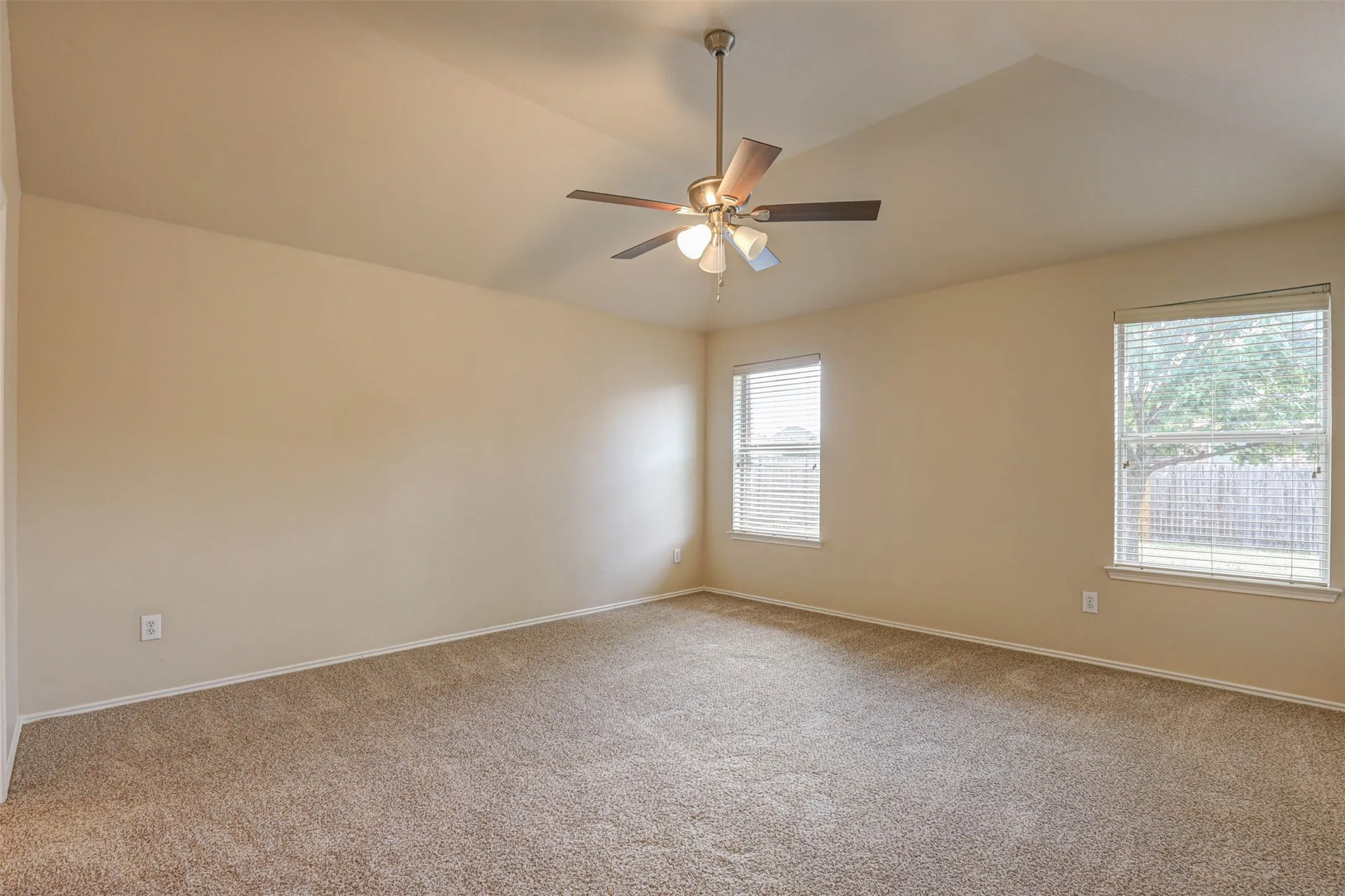 Spacious master bedroom with lots of natural lighting