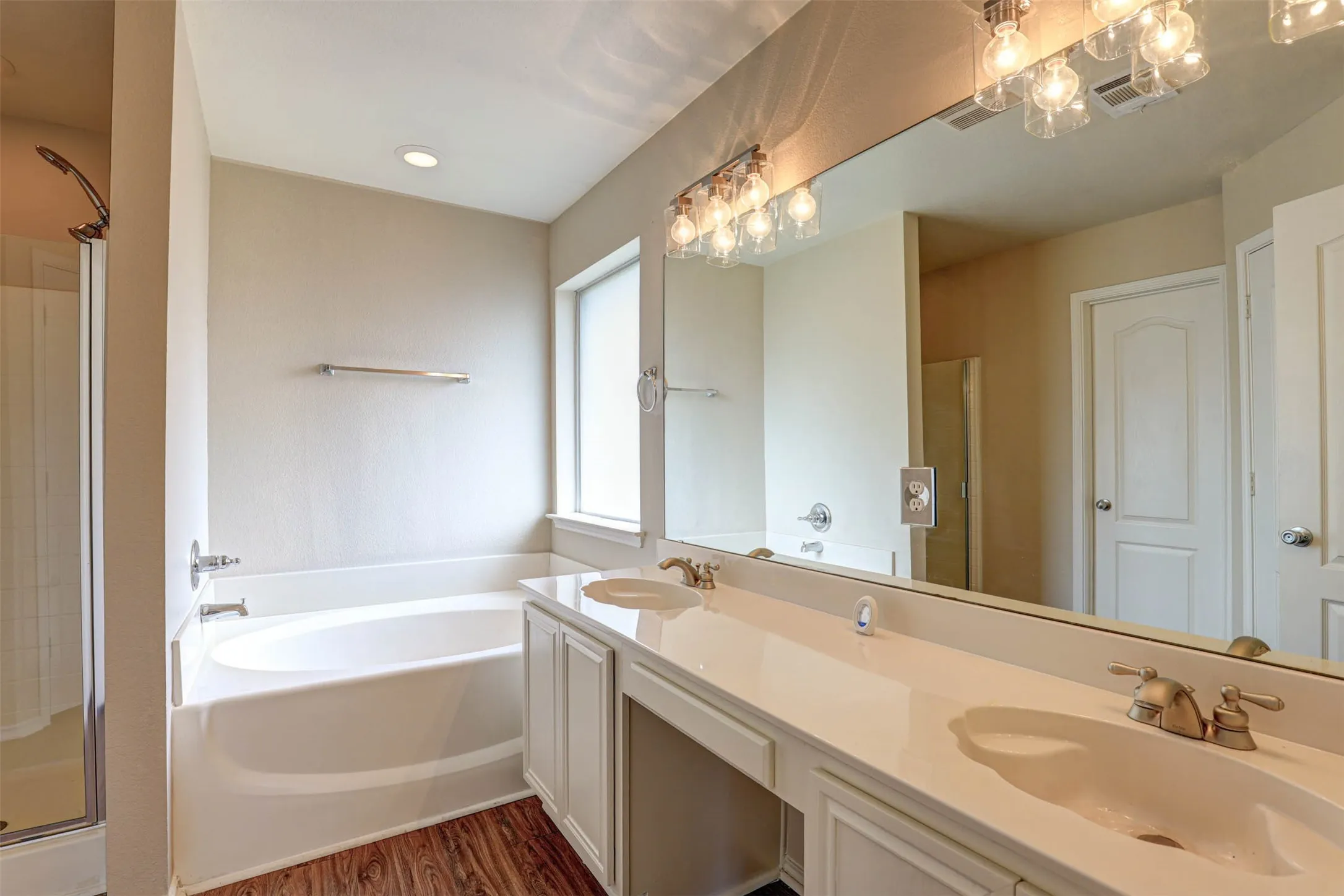 Very pretty master bathroom with everything to start and end your day