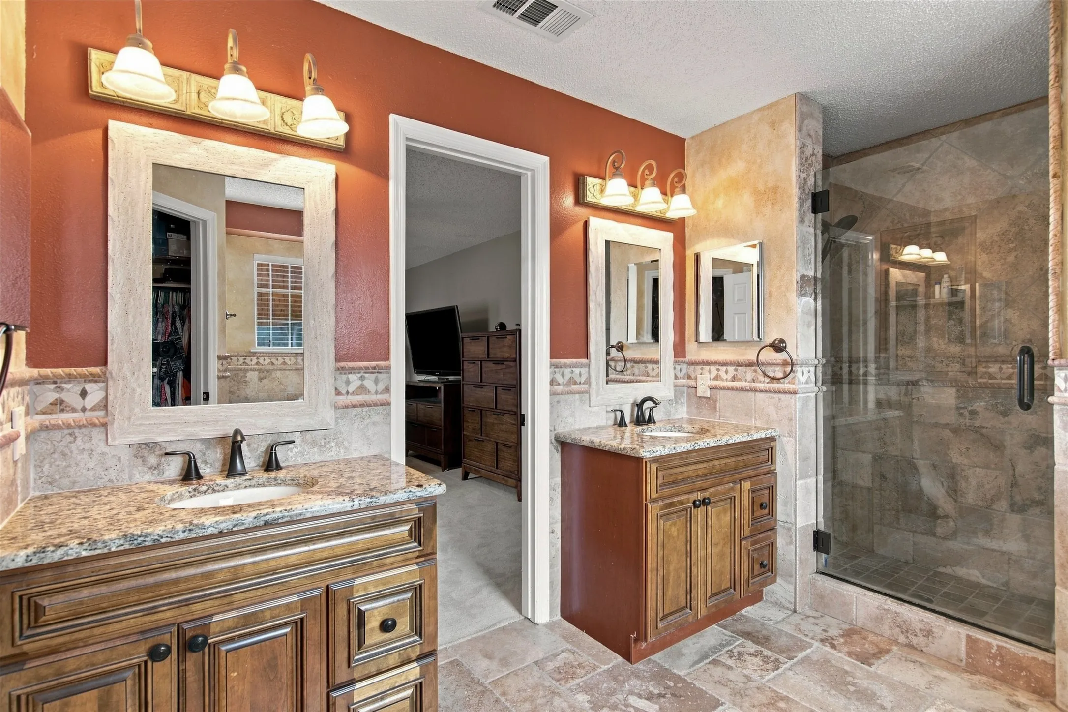 Master Bathroom view 2 with Double Vanities, and upgraded shower