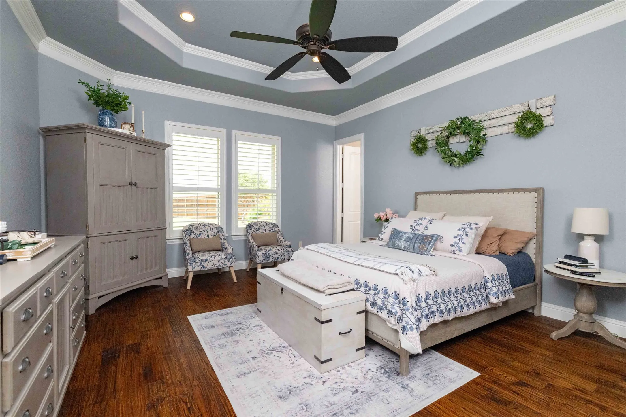 Downstairs Private Primary Suite w Tray Ceiling & Hardwood Floors...