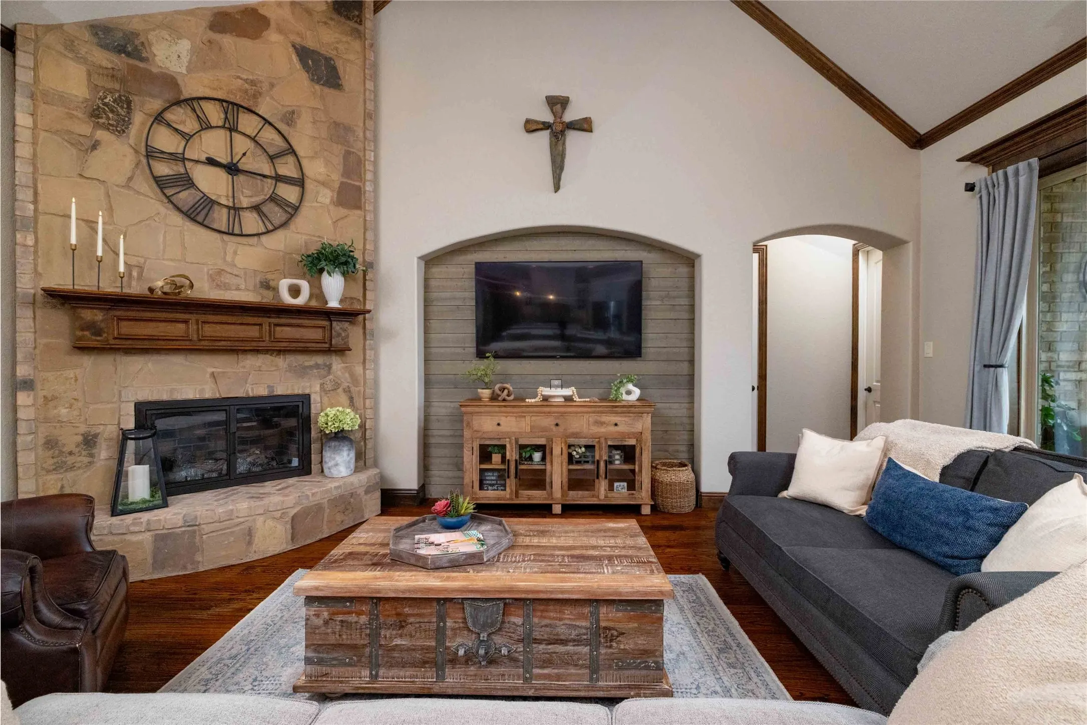 Spacious Living Area w Corner Stone Fireplace w Gas Logs & Vaulted Ceiling...