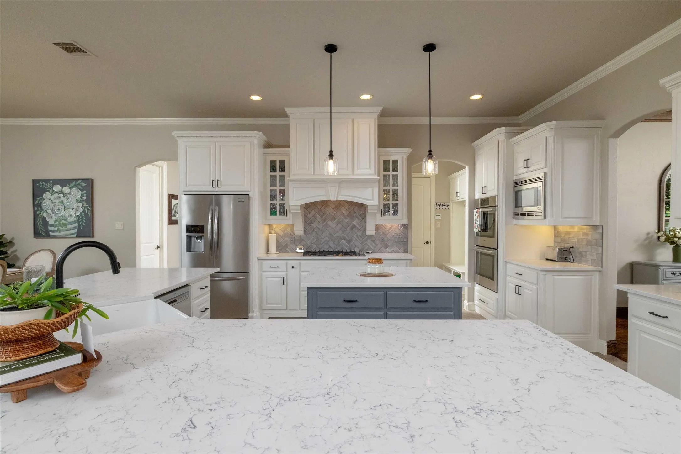 Beautiful Quartz Countertop w Breakfast Bar Seating is Great for Entertaining...