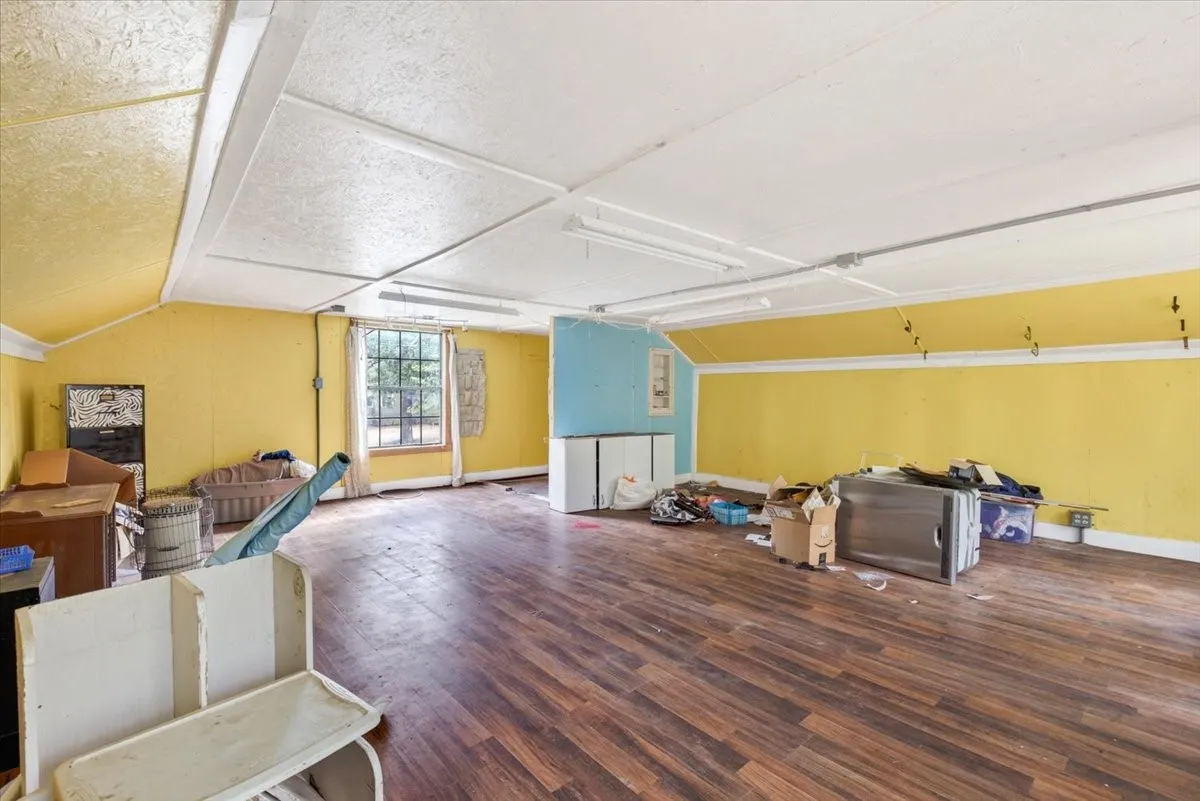 Wood-finish flooring with a multi-pane window