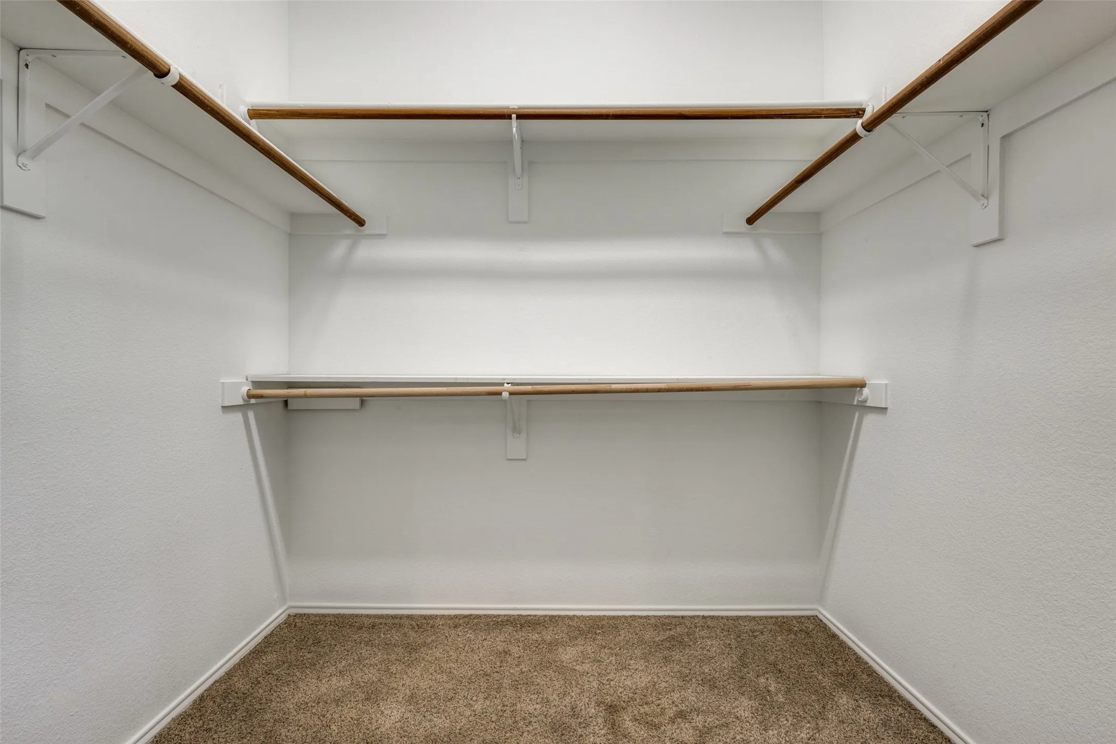 Built-in closet shelving and hanging rods