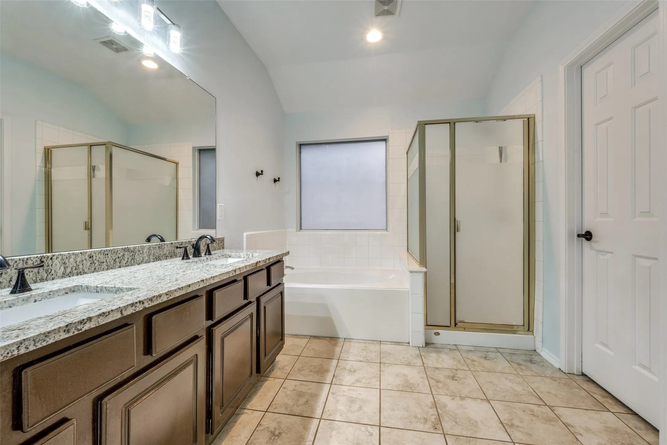 Dual sink vanity with stone-finish countertop