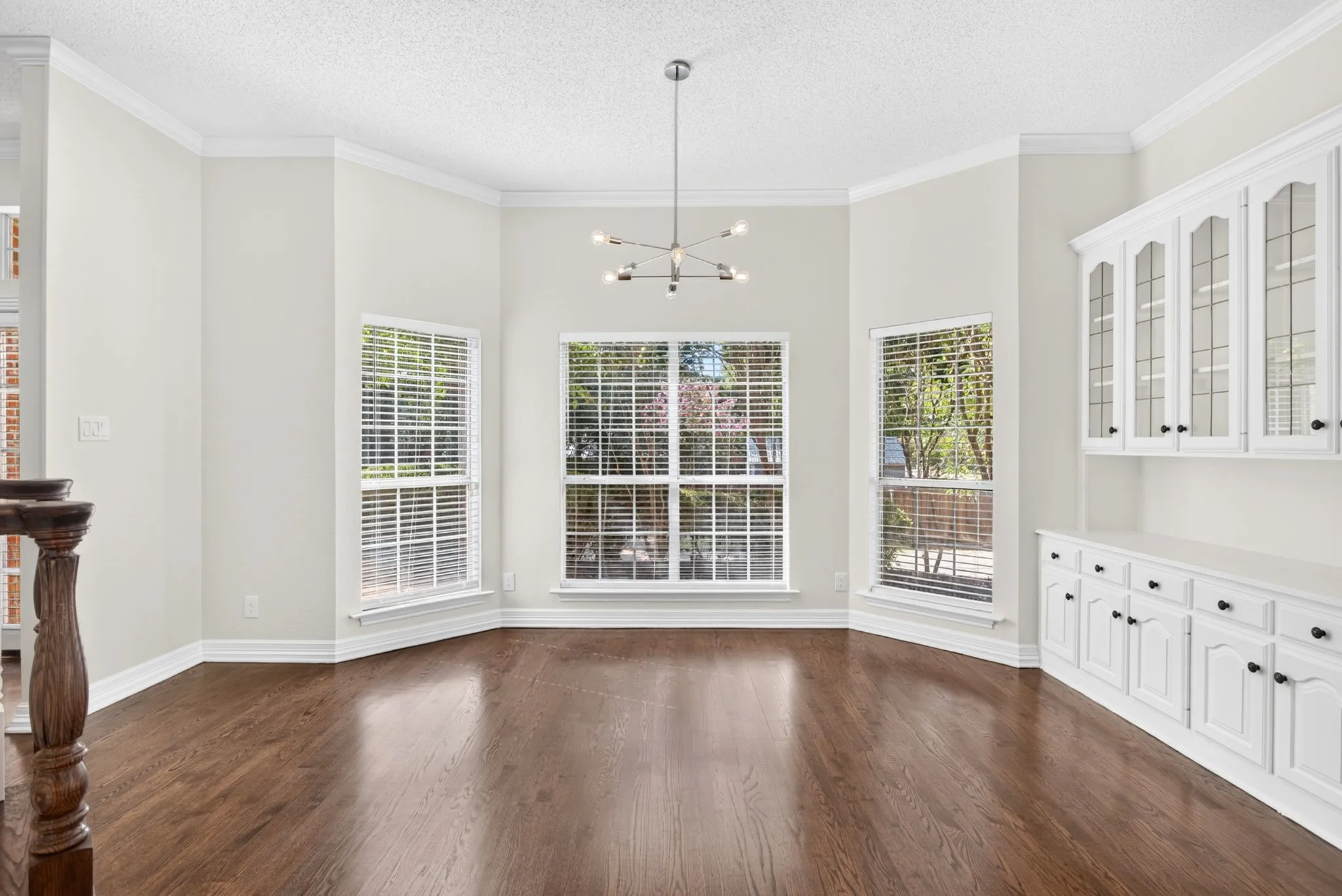 A second dining area in the kitchen with a breakfast bar and beautiful built-ins