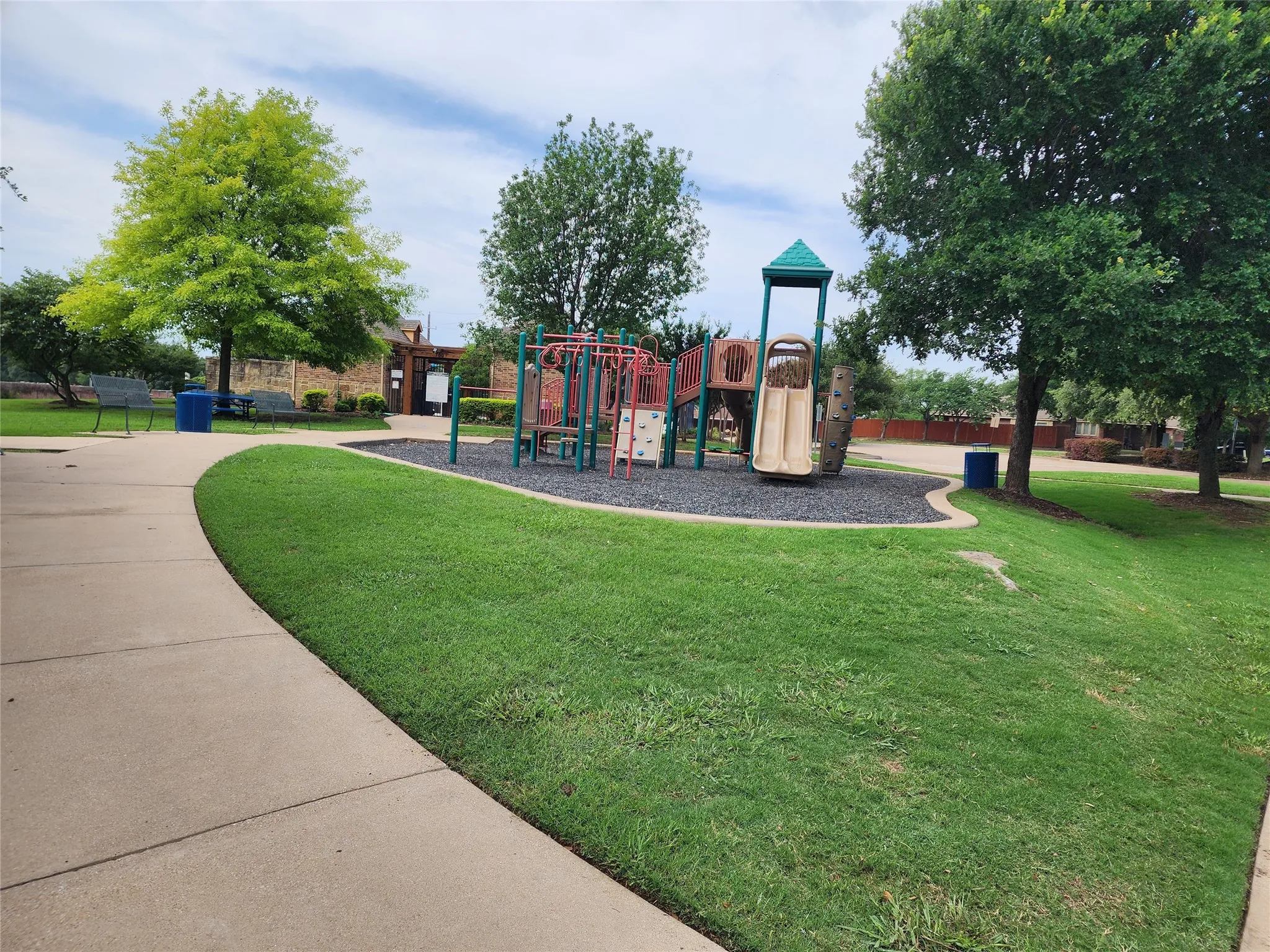 View of play area featuring a lawn