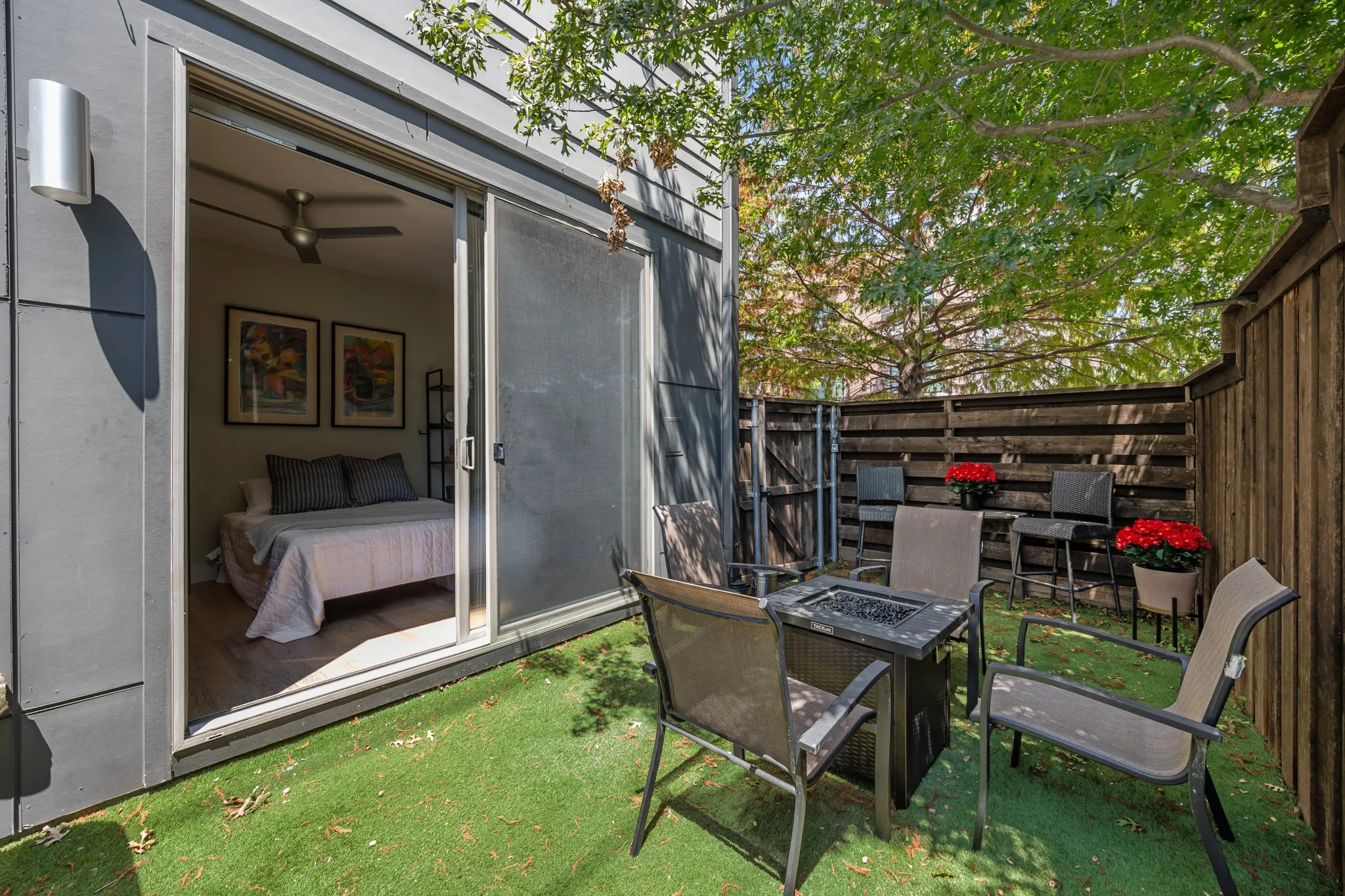 Private turfed patio off the first-floor bedroom