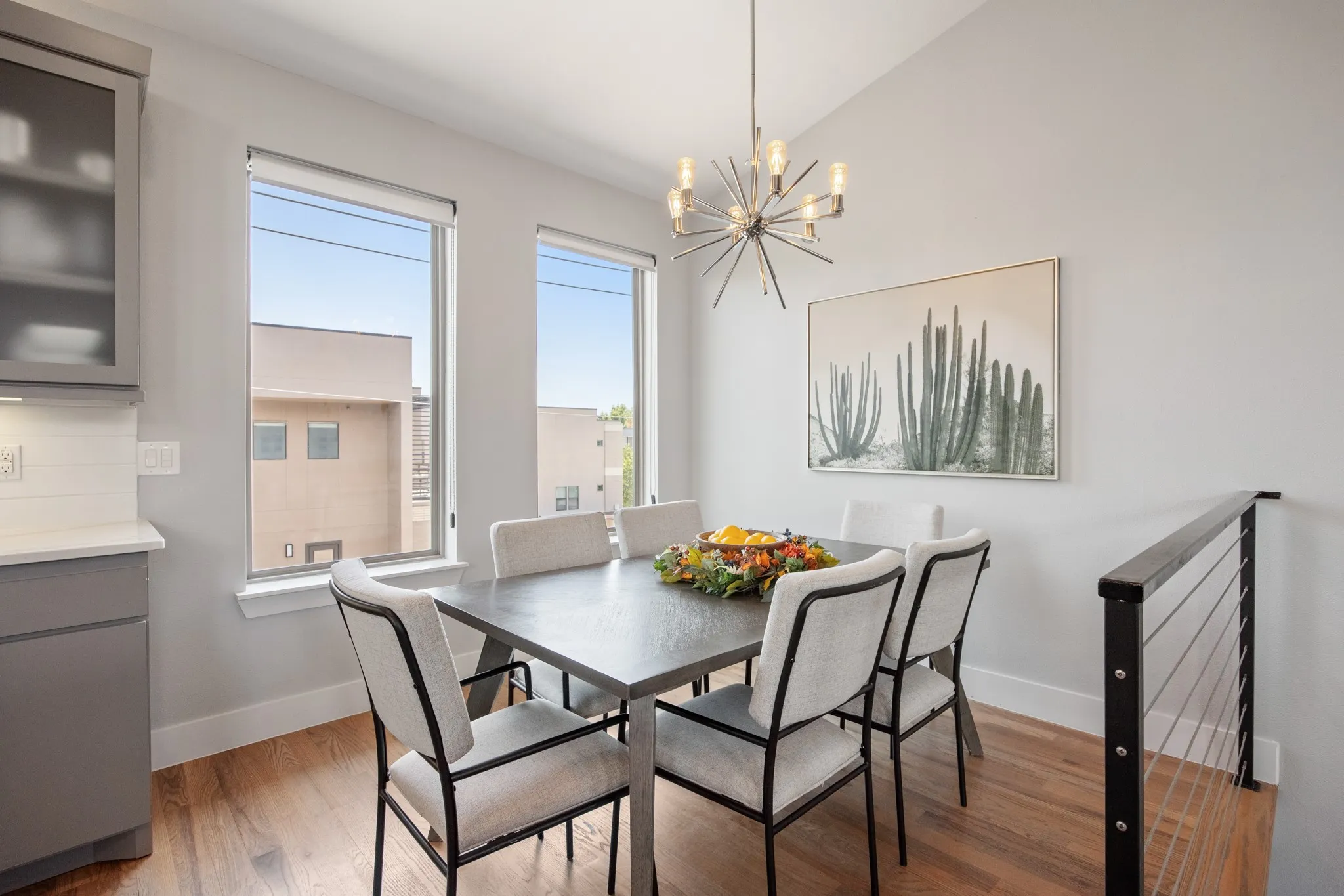 Dining area under a sputnik chandelier