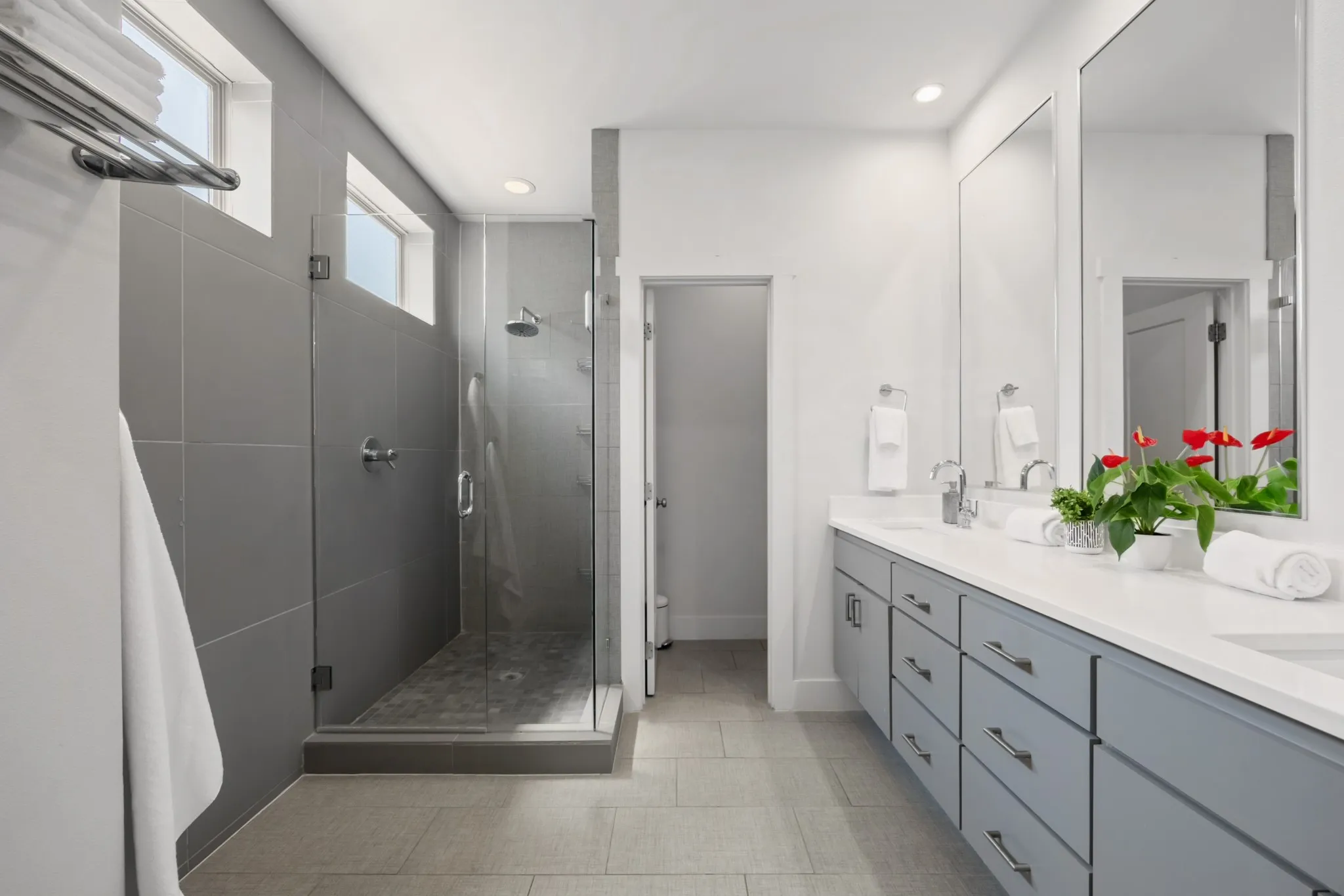 Primary bath with dual vanity and glass shower