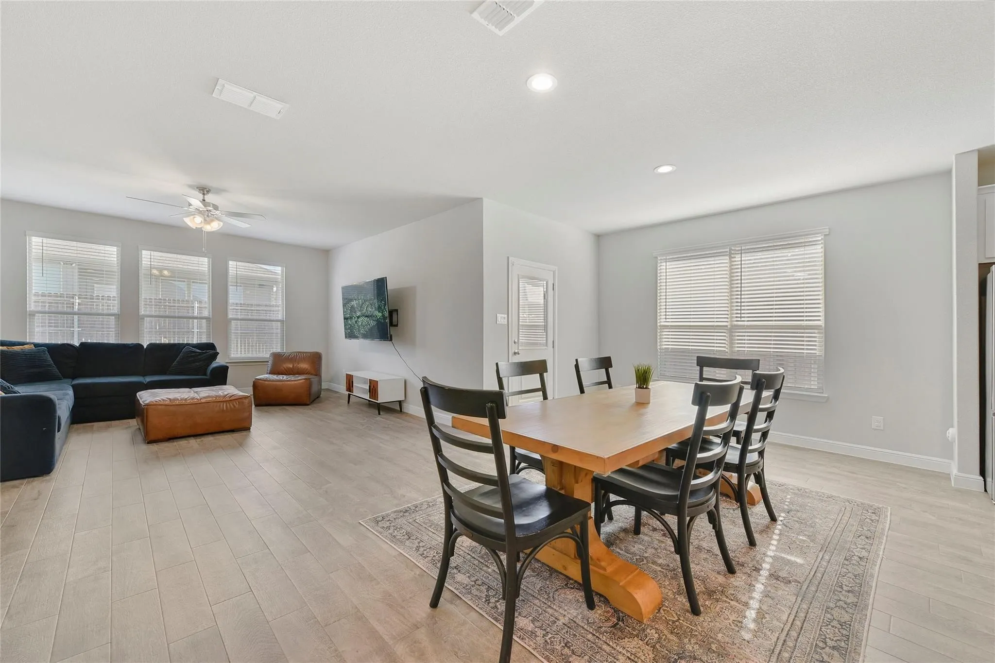 Dining area featuring light hardwood / wood-style floors and ceiling fan
