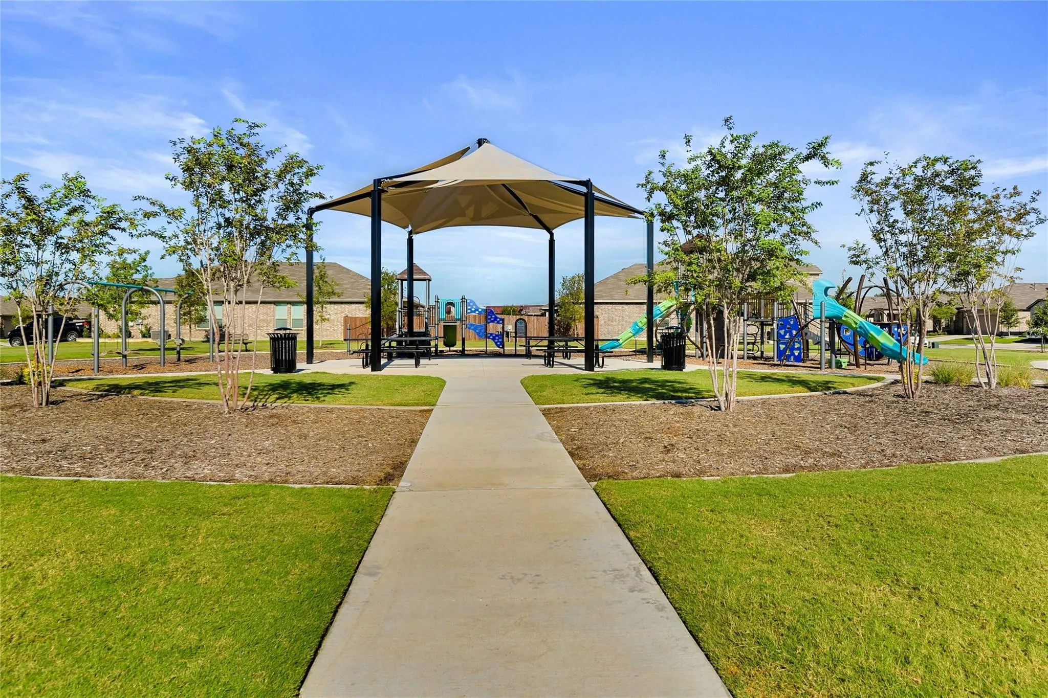 View of playground with a yard