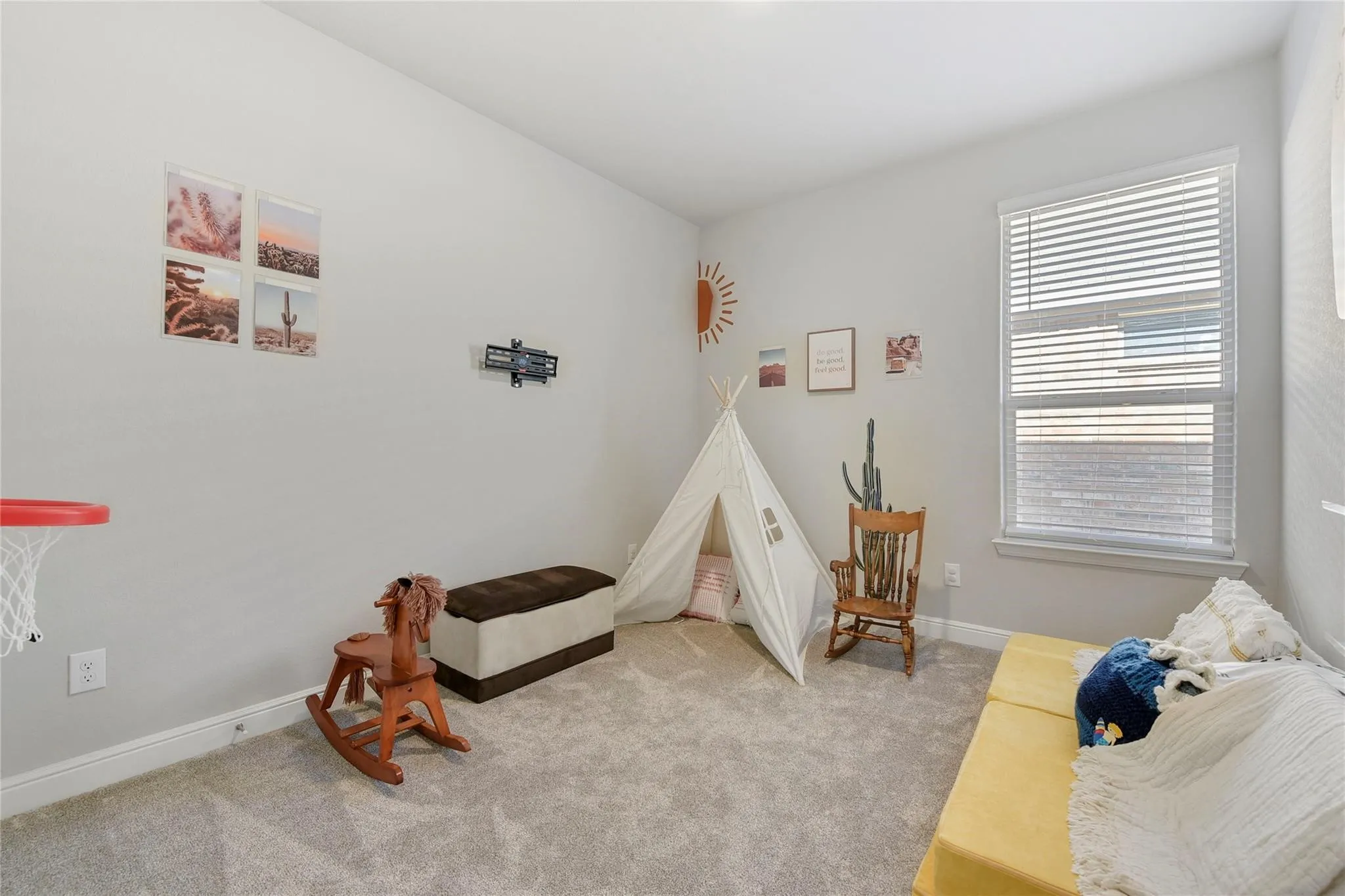 Rec room with light carpet