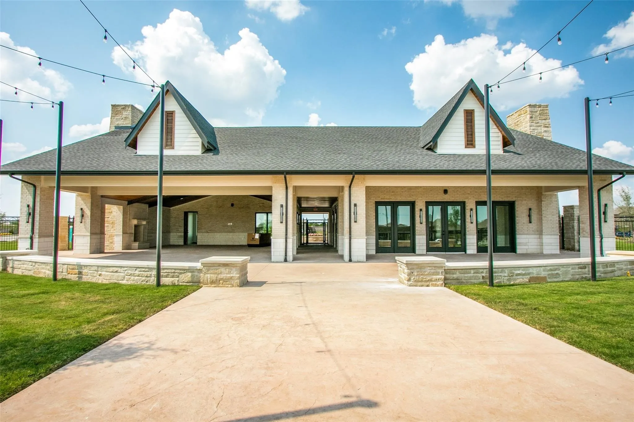 Back of house featuring french doors, a yard, and a patio area