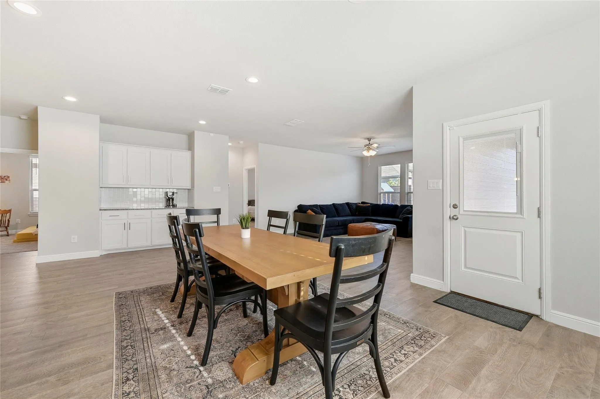 Dining area featuring light hardwood / wood-style floors and ceiling fan