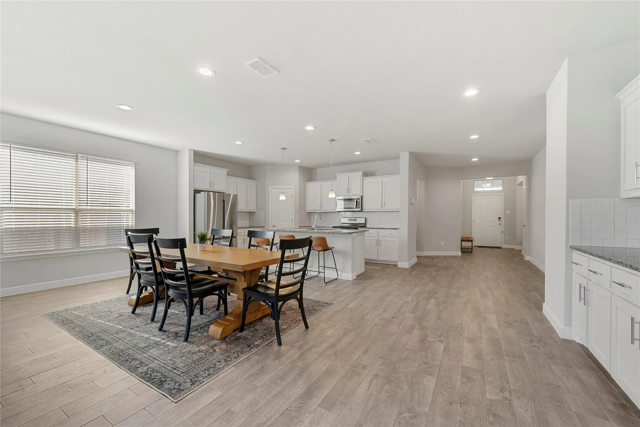 Dining area featuring light hardwood / wood-style flooring