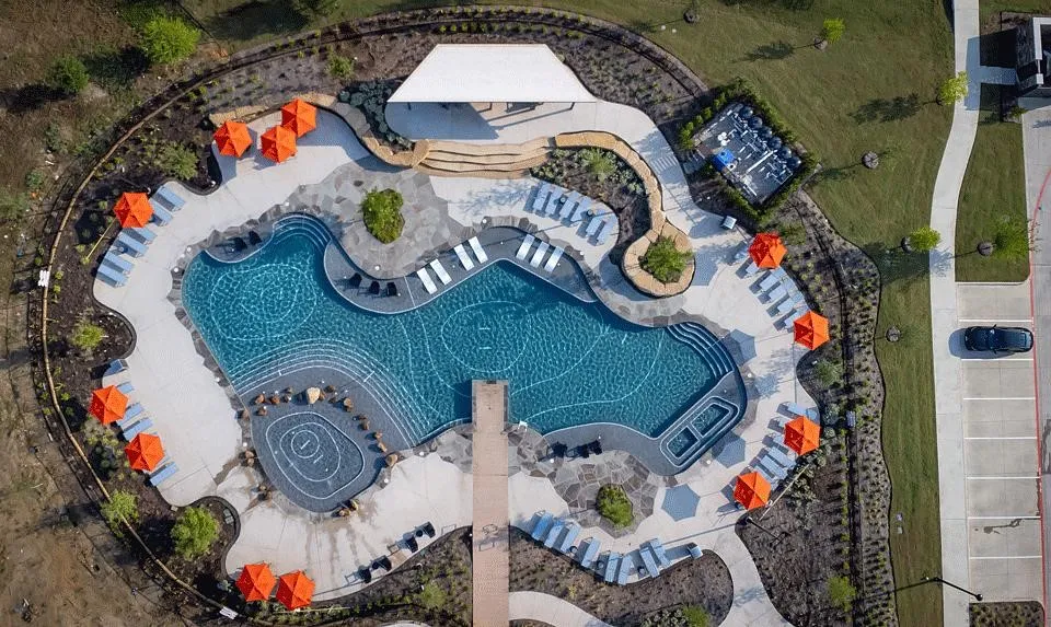 Trinity Falls photo from their webiste  showing one of the many amenities, trails, pools, gym and parks.