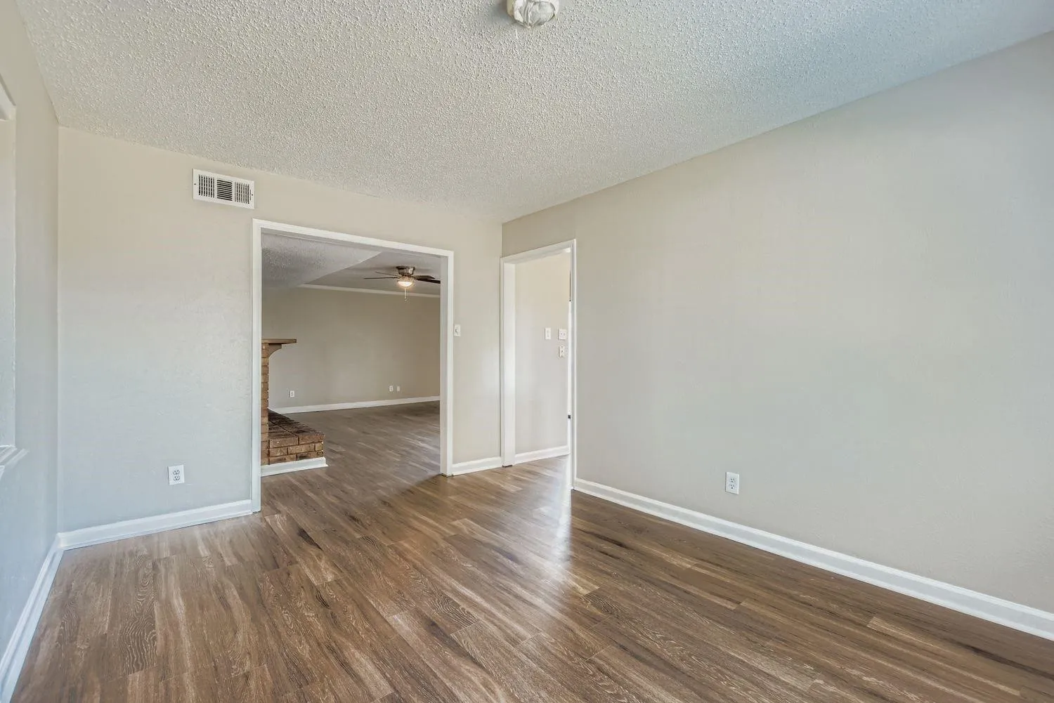 Wood-finish flooring throughout