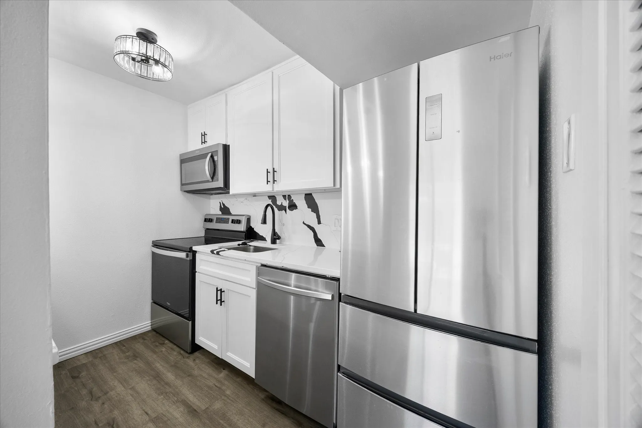 Updated kitchen with refrigerator included.