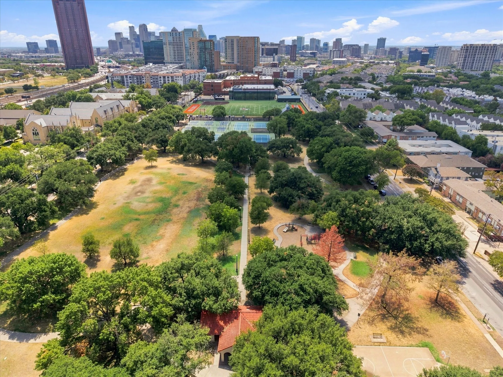 Central Park is away from Cole Park's expansive green space with mature trees, paved pathways, and an adjacent tennis and pickle Ball Courts.