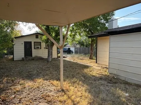 Apartment has separate parking off alley