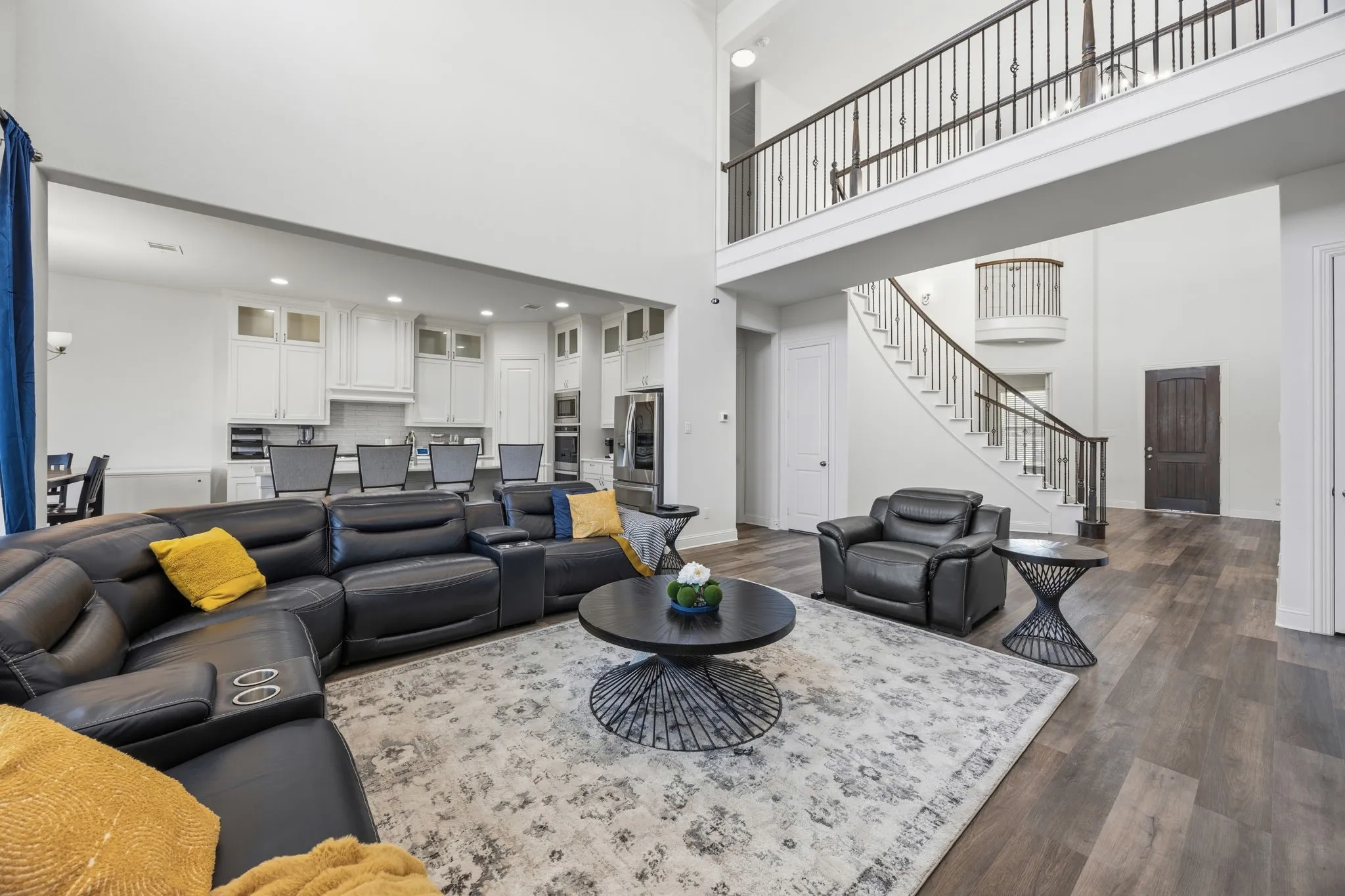Vaulted ceilings and wood-finish flooring