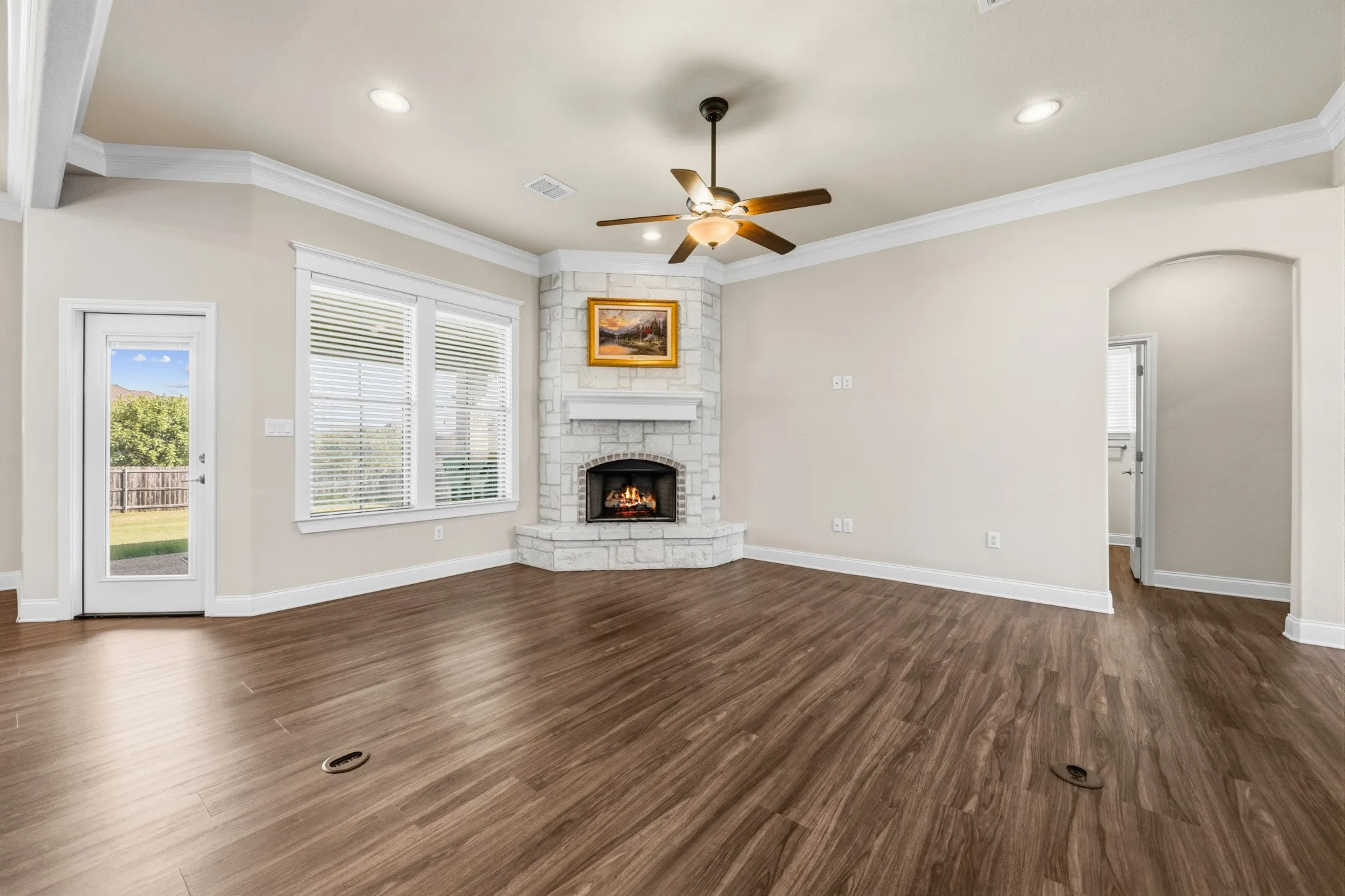 Living Room with Austin Stone corner fireplace