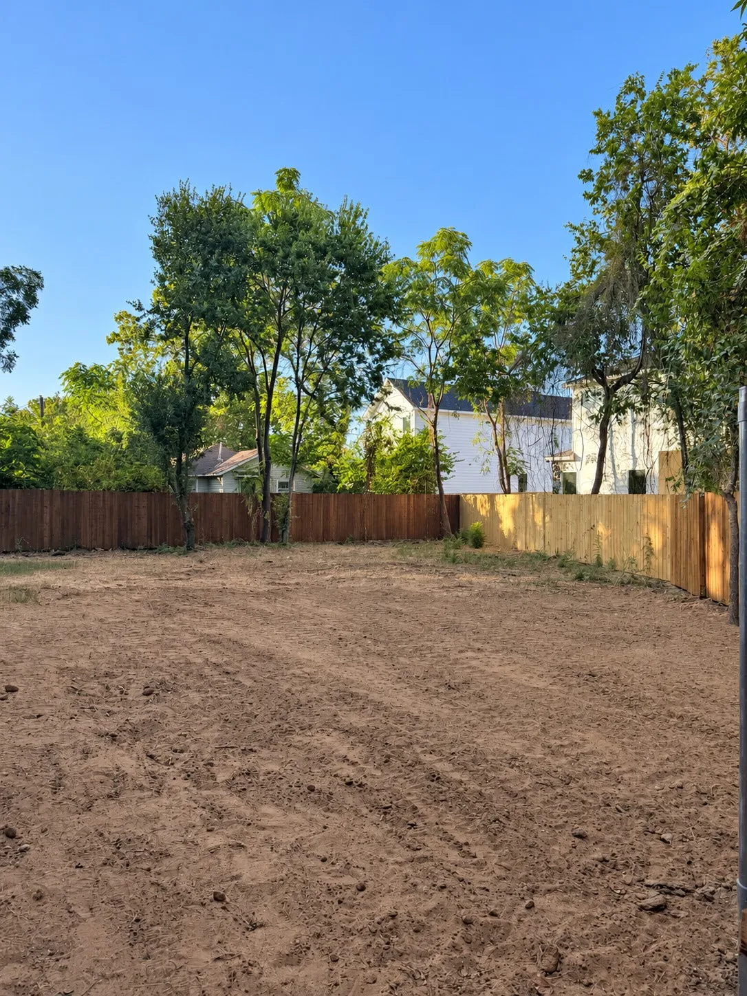 Expansive back yard with perimeter fencing