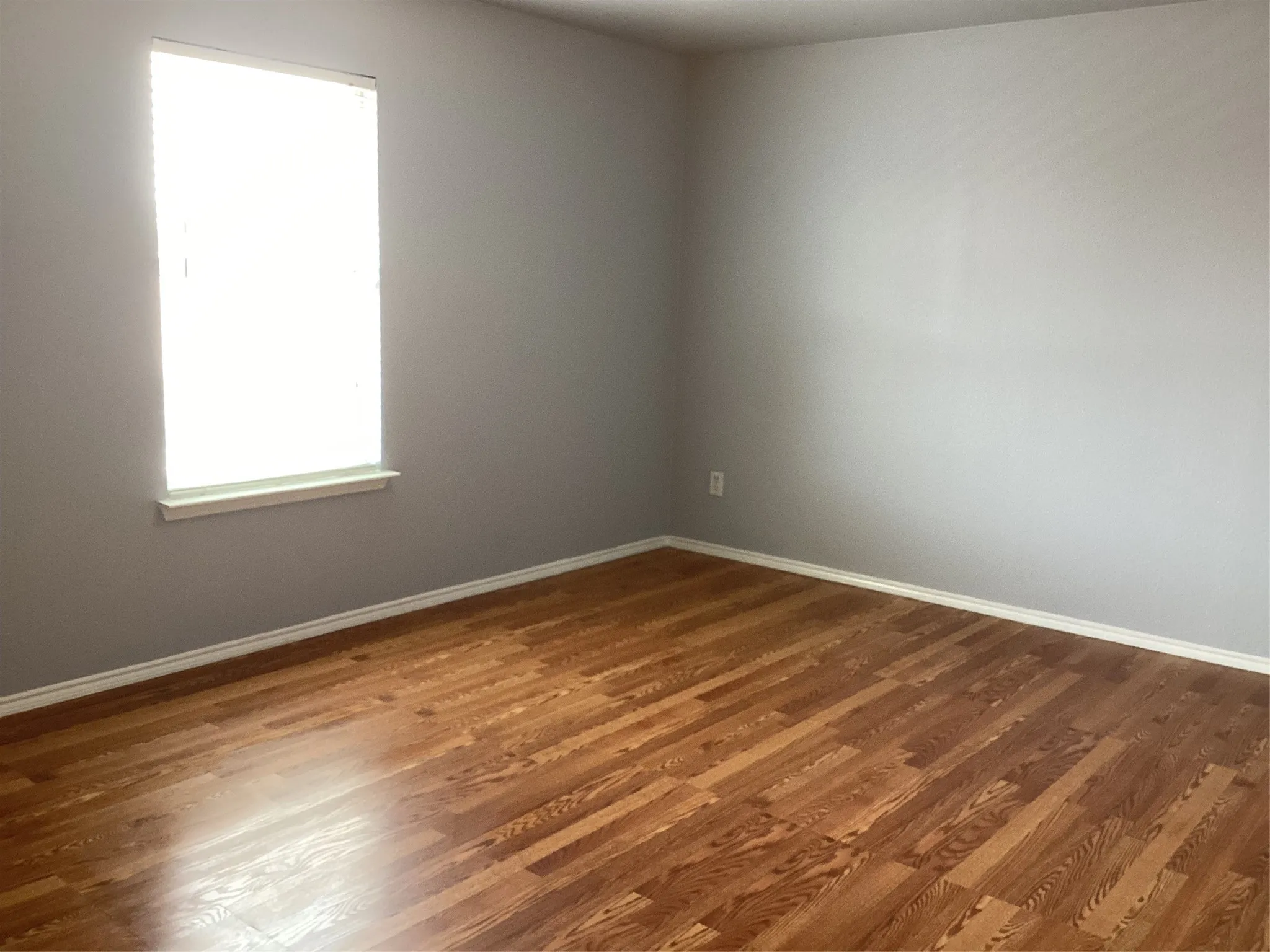 Wood-finish flooring with white trim