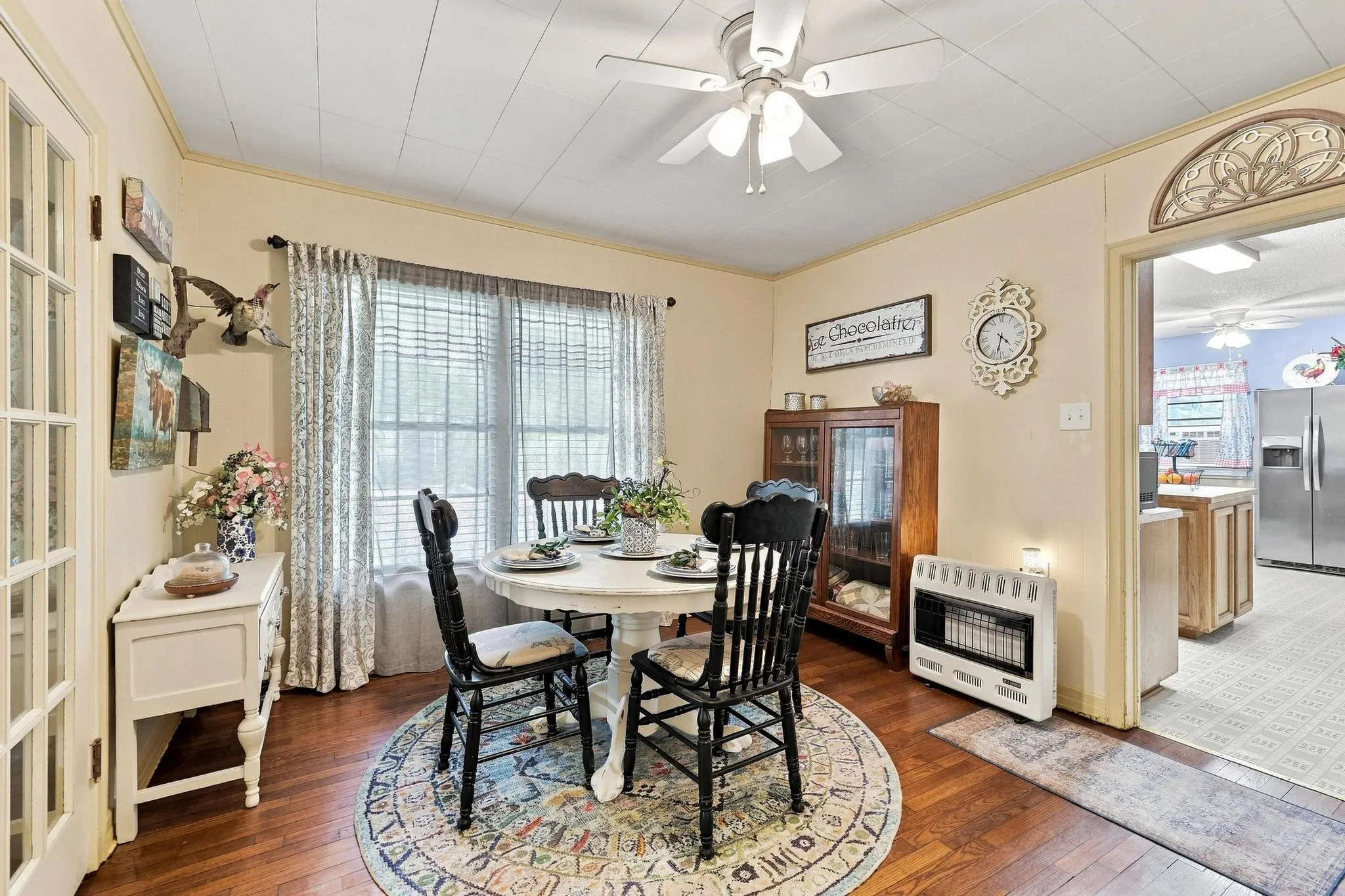 dining area with gas heat and lots of natural light