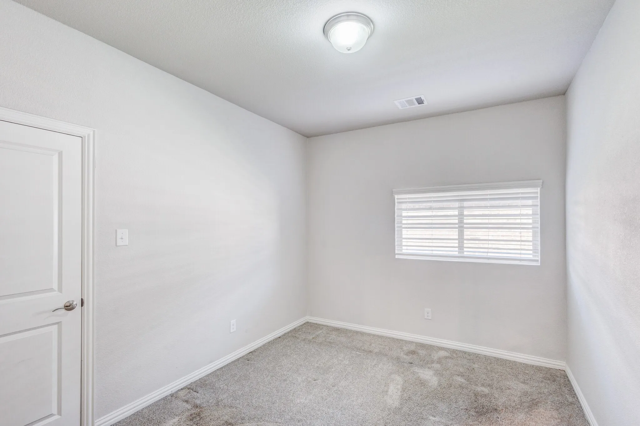 White painted walls with textured finish