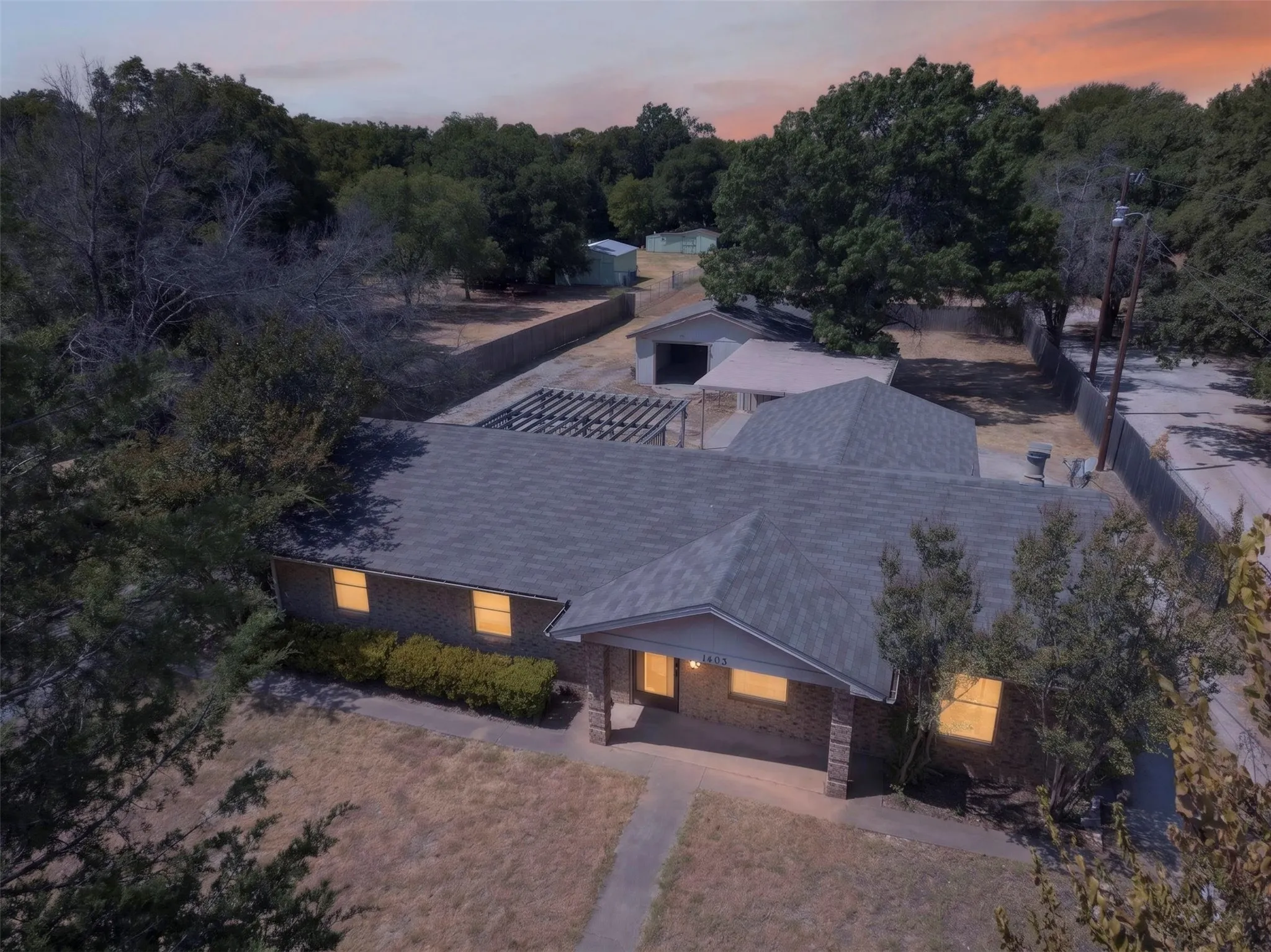 Single-story residence with a gabled roof and brick facade