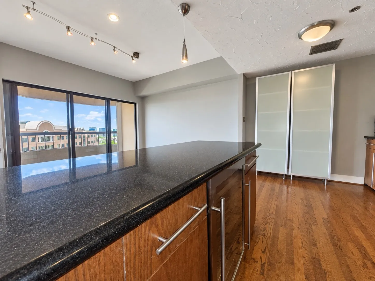 Expansive counter space with a dark stone countertop