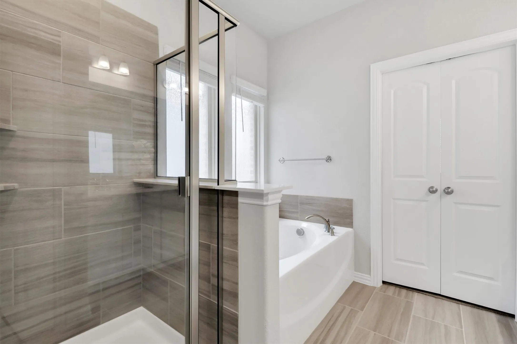 Glass-enclosed shower