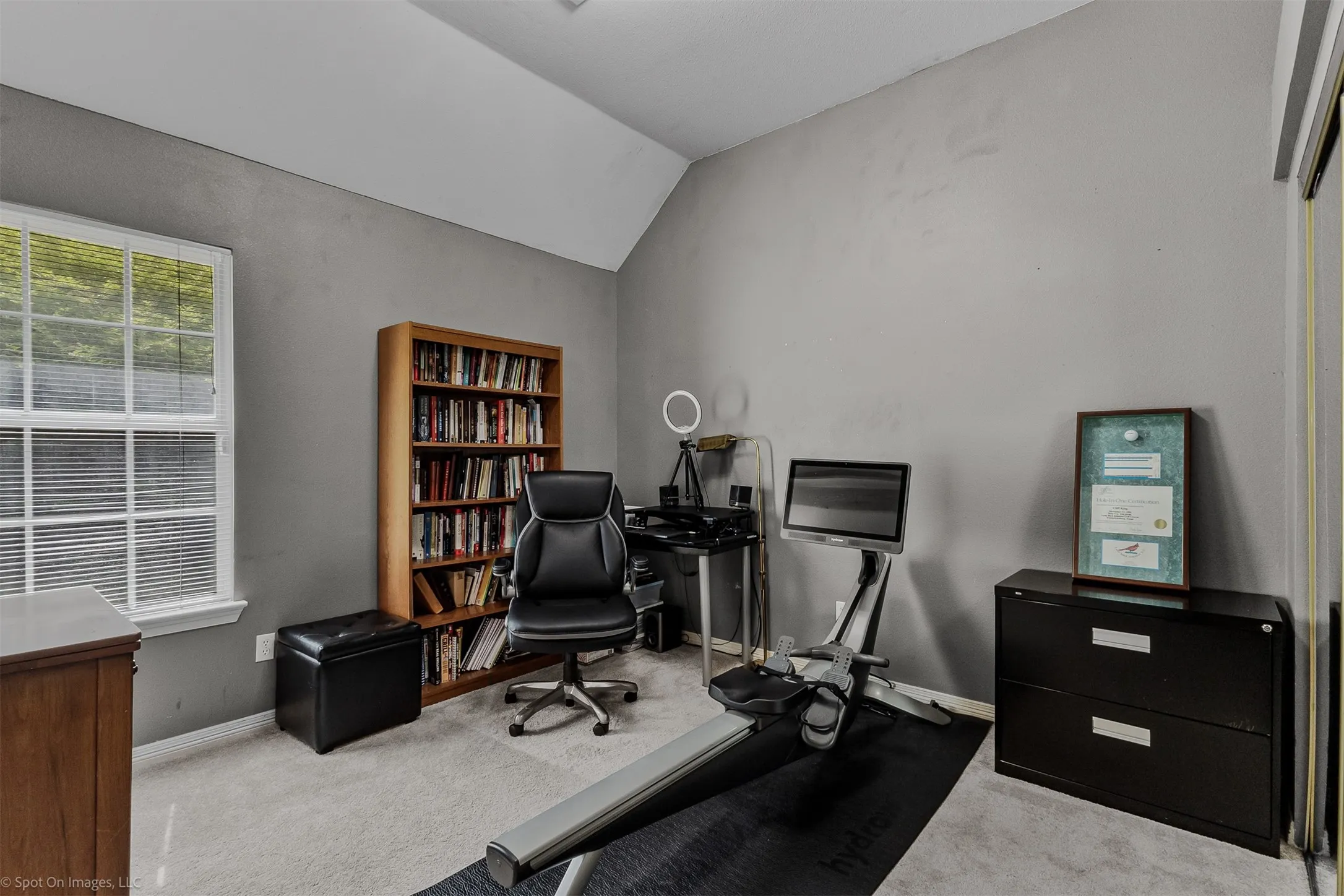 Homeowners made this bedroom an office and workout area
